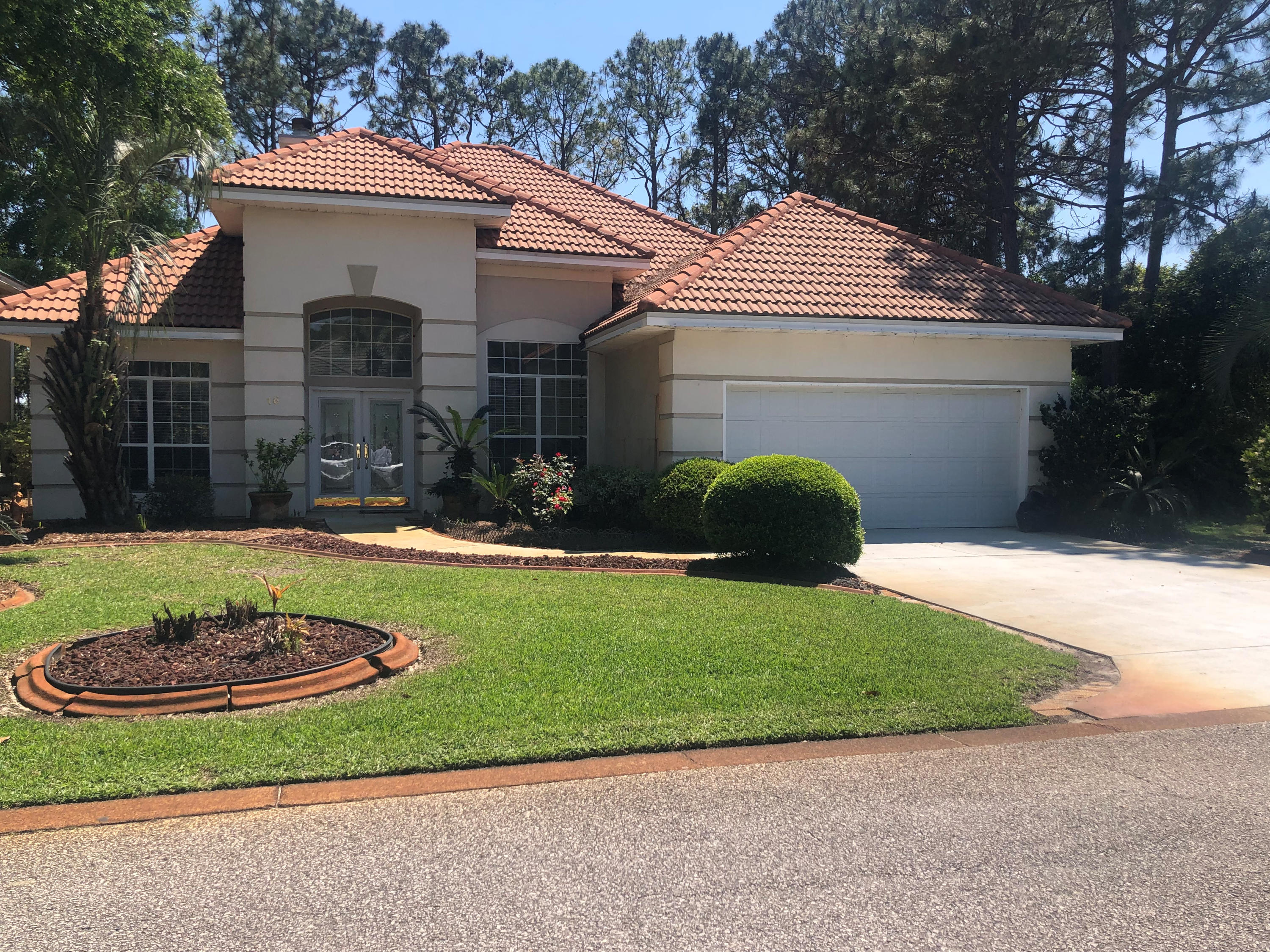 Don't miss this chance to own a beautiful home in the gated golf community of Emerald Bay. The screened back patio looks out onto the 7th Green!