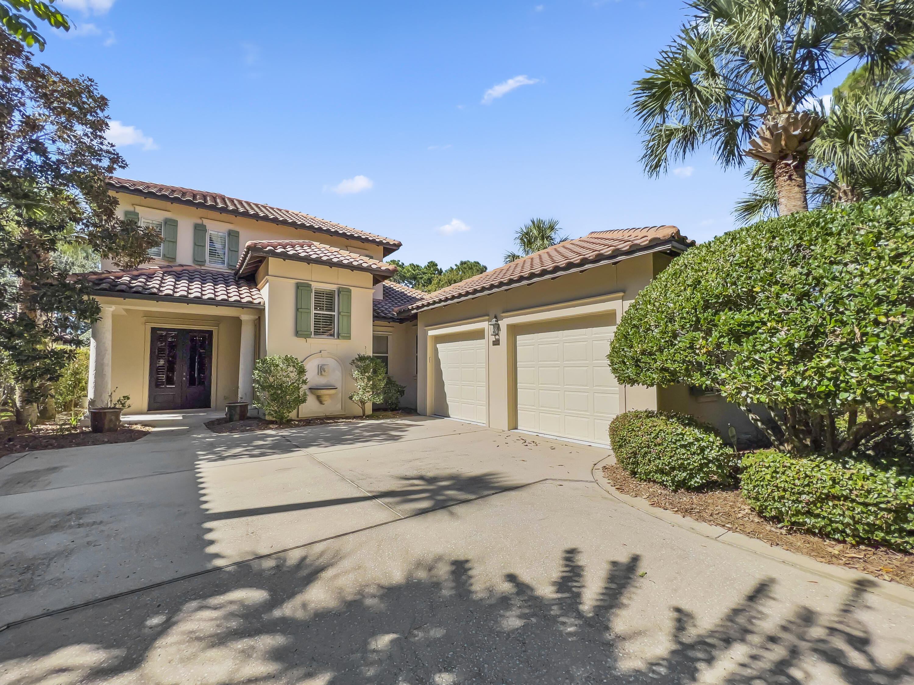 NEW PRICE! If you think you've seen the ultimate golf course home in the Vineyards in the Sandestin Golf & Beach Resort,  think again. Located on #7 Raven golf course..... A MUST SEE! Home is being sold furnished with Cadillac Escalade 6 seat golf cart! Home features a large, heated open-air pool and privacy landscaping provides plenty of room for sunning and nighttime relaxing.  Charleston courtyard garden lures you out the French doors from the master bedroom and is low maintenance. Designer kitchen built for entertaining with ''Cabinets by Design'' touches encompassing extensive storage and a beautiful pantry/bar/wine cooler alcove unique to this home. Built-in cabinetry in the living room, master bedroom and richly finished office with beveled glass doors.  The Vineyard HOA fees are $375.00 a month and SOA fees are $422.05 a quarter.