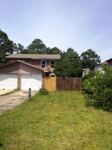 Great location only a few minutes to Hurlburt or Eglin AFB. Large fenced in back yard, and a detached garage. New Tile downstairs.