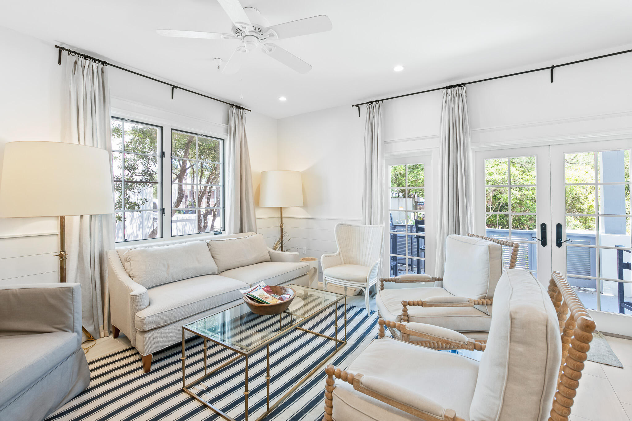 Stunning first floor condo located in The Flats II in Rosemary Beach that was renovated by Ashley Gilbreath Designs. Walking into this bright and updated condo, you will instantly feel at home with the natural light flowing inside from the abundance of windows that surround the living and dining areas complimented by the soft, natural tones of the interior decor. The kitchen has beautiful, white Quartz countertops, built-in cabinet refrigerator, stainless steel oven and dishwasher. There is also a hidden stackable washer and dryer next to the pantry. Walking down the hallway, the first of two bedrooms is on your right and is equipped with queen sized bed and cute built-in bunkbeds perfect for children. Across the hall is a full bath that has white Quartz countertops and beautiful white hand carved subway tile in the shower. Finally, secluded at the rear of the condo is the spacious master suite. Beautifully decorated and furnished with a large Queen bed you will feel ready to curl up with your favorite book. The large master bathroom has a double vanity with white, Quartz countertops and an oversized walk-in shower accentuated with white, hand carved subway tile and inlays for a beautiful look. 

Come experience everything that Rosemary Beach has to offer from incredible restaurants, stores, tennis club, fitness center, four community pools and the exclusive private owners pool and pavilion which is only steps away from this condo. While information contained with in this listing is believed to be accurate and true but is not guaranteed, buyer should verify all information.