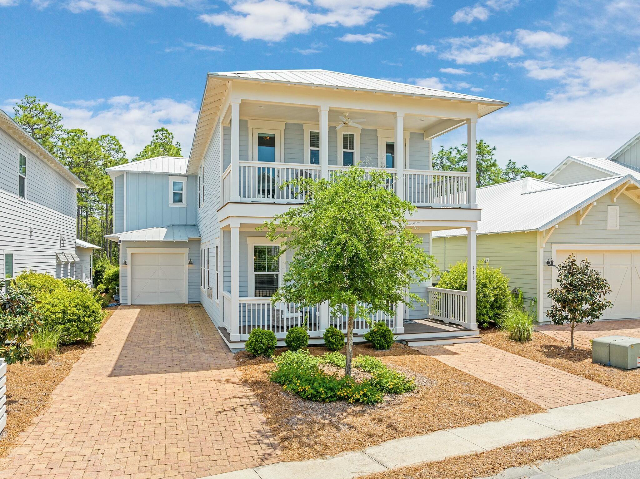 Welcome to 116 Prairie Pass, a beautifully designed 4-bedroom, 3.5-bathroom retreat located in the highly desirable NatureWalk at Seagrove community. This home is in like-new condition, having been barely used and only sparingly rented, and comes fully furnished for a move-in-ready experience. This charming coastal home backs directly onto the serene Point Washington State Forest, offering a peaceful and private backdrop with access to over 15,000 acres of preserved nature trails for hiking, biking, and exploring. The interior features a spacious open-concept layout ideal for entertaining, with a gourmet kitchen that flows seamlessly into the dining and living areas. High-end finishes, coastal-inspired design, and abundant natural light make this home feel both comfortable and luxurious. Additional highlights include an extended one-car garage with ample space for storage or a golf cart, and a generous backyard with room to add a private pool, perfect for creating your own outdoor oasis. Residents of NatureWalk at Seagrove enjoy access to "The Gathering Place," a private amenity center featuring a zero-entry beach-style pool, heated lap pool, hot tub, kids' splash pool, fire pit, outdoor grills, and a clubhouse with shaded lounging areas and a full outdoor kitchen. The community also offers pickleball and basketball courts, a Tot Lot playground, and a fitness trail with outdoor workout stations. Plus, the popular Lilly Lane Beach Trail provides a convenient and scenic path straight to the sugar-white sands of the Gulf. Whether you're looking for a full-time residence, vacation getaway, or income-producing property, 116 Prairie Pass combines the best of privacy, community, and coastal living along 30A.