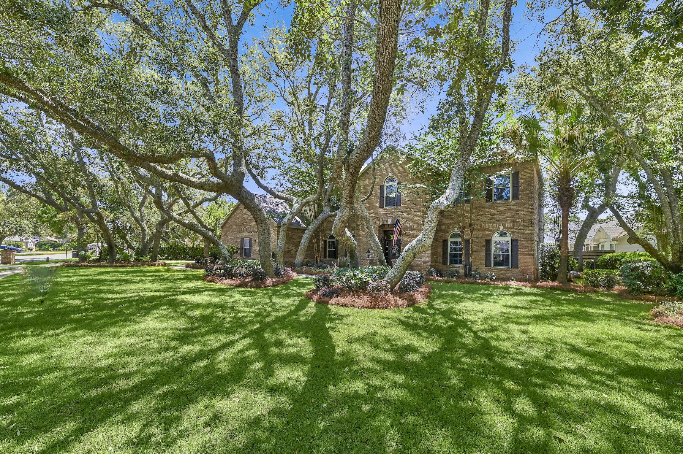 Exquisite custom-designed and built 2-story home with elegant and timeless traditional architectural details situated on property lined with mature sand oaks. This home, located in the heart of the Indian Bayou Golf Club, is a short bike or golf cart ride to the Gulf of Mexico beach and seashore. The private enclave neighborhood is bordered by Indian Bayou itself and is a popular location for families and retirees alike, as this neighborhood is tucked away from the busy atmosphere of vacationers visiting Destin. Make this home your primary residence or your vacation home.  MORE... The brick home boasts 5366 square feet, with 4245 of living space, with 4 bedrooms, 5 baths, and 1 half bath. As you enter, you'll step into the soaring entry, the focus is on the expansive staircase. A few steps further, you'll enjoy the magnificence of the formal living room to one side and the large formal dining room to the other side, each framed by many windows overlooking the landscaped property. The home's master suite includes views of the outdoors, a spa-like bath, plus his/her vanities and his/her closets. A bonus room upstairs can used as a private office/workout room with built-ins and has a great view of the pool and outdoor living area. 

The open-concept gourmet kitchen, with a center island and a separate breakfast bar, has upgraded appliances and a kitchen dining room. It overlooks the comfortable family room with a gas fireplace and a hidden wet bar with an ice maker. A game room/card room with built-in shelves is just off this space. The butler's pantry is adjacent to the kitchen and features built-in wooden shelving for ample storage. One door off the kitchen dining room leads to the large double car garage with automatic doors. The other door leads to a spacious laundry room with a laundry sink, with space to accommodate a large freezer and refrigerator, custom cabinetry ideal for additional storage, and a full pool bathroom with easy access, with its own entrance, from the outdoor living area. The staircase leads you to the master suite and the 3 secondary ensuite bedrooms, each with its own bathroom; all bedrooms boast large windows overlooking the home's gardens and grounds. Featured flooring throughout the home is hardwood, tile, and carpet. 

The family room, kitchen, and breakfast room overlook the swimming pool, outdoor kitchen, and covered living area, ideal for al fresco dining, relaxing, and entertaining. The outdoor kitchen features a new custom built-in grill, burner, and warming drawer. For cooler evenings, you can gather around the outdoor fire pit and watch the stars twinkle. The property has a Horizontal Shadowbox fencing, installed in April 2022, and the grounds were landscaped in May 2023. As an additional bonus, the home features a Generac Power System house generator, and the outdoor living space gutters are outfitted with Leaf Filters. The lawn is low maintenance and has a Rain Bird sprinkler system. 

Meticulously maintained, the home's upgrades include a new architectural shingle roof, installed in February 2023, 2 new tankless hot water heaters, installed in April 2023, and trim and fencing painted in May 2023. Windows are high-impact, and storm shutters are in place for door openings. The home is protected by a monitored security system. Current owners' custom built this home and it has never been on a rental program. 

The home also has high efficient HVAC units under seven years old. This home is NOT in a flood zone and is in a neighborhood eligible for the National Flood Insurance Program.

Indian Bayou neighborhood, located in sunny Destin, Florida, is a short golf cart ride or drive to the beach, award-winning restaurants, world-class local shopping, family amusements, and Henderson Beach State Park. A retail outdoor shopping center, Destin Commons, is also nearby, featuring restaurants, an AMC Multiplex Movie Theater, fashion boutiques, and various specialty shops. Harbor Walk Village on Destin's picturesque harbor and marina is less than ten minutes away. It is home to dockside restaurants with bars that play live music, family amusements for kids of all ages, free open-air concerts, fun festivals throughout the year, and seasonal firework displays festively choreographed with outdoor music systems. Destin is known as the "world's luckiest fishing village" and boasts the largest charter fishing fleet in the United States.