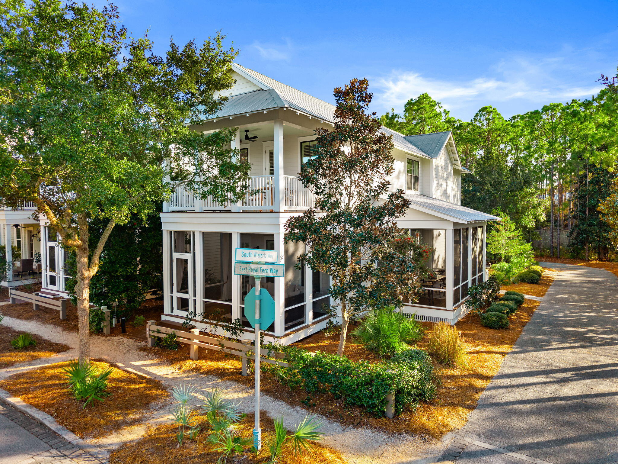 CURRENTLY UNDER CONTRACT. SELLER WILL CONSIDER BACK UP OFFERS There is perfection and privacy with this stunning southern coastal home. This meticulously maintained beach retreat is surrounded by preserve on two sides and comes fully furnished, and the LSV Golf Cart stored in the attached garage which is great for exploring this golf cart friendly neighborhood. Watercolor has private beach access bordering Grayton Beach State Park, 9 community pools, tennis courts, pickleball, miles of nature trails, direct access to the 19-mile Timpoochee bike trail, beautiful parks, and green space. Numerous clubs and social events will keep the whole family entertained. Complimentary tram service is provided to the Town Center for boutique shopping and restaurants or spend the day at the exclusive Watercolor Beach Club with zero-entry pool, a newly designed direct boardwalk access to the beautiful white beaches and gulf view restaurants.  Groundbreaking for the new fitness club and additional four pickleball courts is scheduled for January 2026 at the award-winning Watercolor Tennis Center. Watercolor Crossing, featuring Publix and a variety of stores and restaurants, is directly connected via golf cart path allowing quick and convenient access. The Boathouse by the bridge at Watercolor rents paddle boards and kayaks too.
From the inviting front screened porch for relief on those hot summer days with new Ashley outdoor sectional for comfort and capacity to the side screened room for your dinner parties with family and friends, this home has it all. Once you walk through the front door, you will be greeted with a downstairs main level with a dry bar / additional prep area to keep the flow open , living room, dining room, kitchen, walk in pantry with mini refrigerator, ½ bath, a master bedroom with a king size bed, an ensuite bathroom with tiled shower double sinks and walk in closet with custom shelving. Shiplap walls add to the luxurious coastal feel.  Designer fixtures and crown molding are featured throughout the entire home. Hardwood floors add beauty and durability while hurricane protection plantation shutters allow abundant interior natural light throughout this gorgeous home. The dining area has an expandable round table and comfortable upholstered chairs for easy conversations. The family room has plenty of seating for everyone. 
The kitchen is a chef's dream with a gas stove, stainless appliances, white cabinetry, and tile backsplash and walk in pantry. There is lots of prep space with the quartz countertops and 3 bar stools great for breakfast or anyone wanting to help prep or converse with the chef.   The furniture and decor were hand-picked by home designers. All fabric downstairs has performance fabric which is perfect for weekly rentals or sticky hands.  
  
The upstairs has a bonus room great for reading, gaming, or flex space with daybed. The upstairs master has a king bed, ensuite bathroom with tile shower, and double sinks. The master closet has custom shelving. Off the master bedroom is a 16' x 10' deck with a daybed swing and with new table and chairs for that morning coffee or afternoon sunset.  The oversized guest bedroom has two twin bunkbeds, full size bed, desk, TV, walk-in closet with custom shelving, and an ensuite bathroom with tub shower combo and double sinks. This home sleeps 10 comfortably with beds for everyone.
Outside you will find an enclosed hot and cold shower and a BBQ area with additional seating perfect for grilling conversations or watching the deer feed in the preserve. Two-car paved parking and garage behind the home provides ample parking and storage for all of your beach gear. The Dragonfly Pool is just a few doors down if you want to relax close to home. 
This is truly a well-maintained southern coastal home thoughtfully designed for entertaining or relaxing. Ask your realtor for the video tour of this beautiful home. Truly a turnkey home .