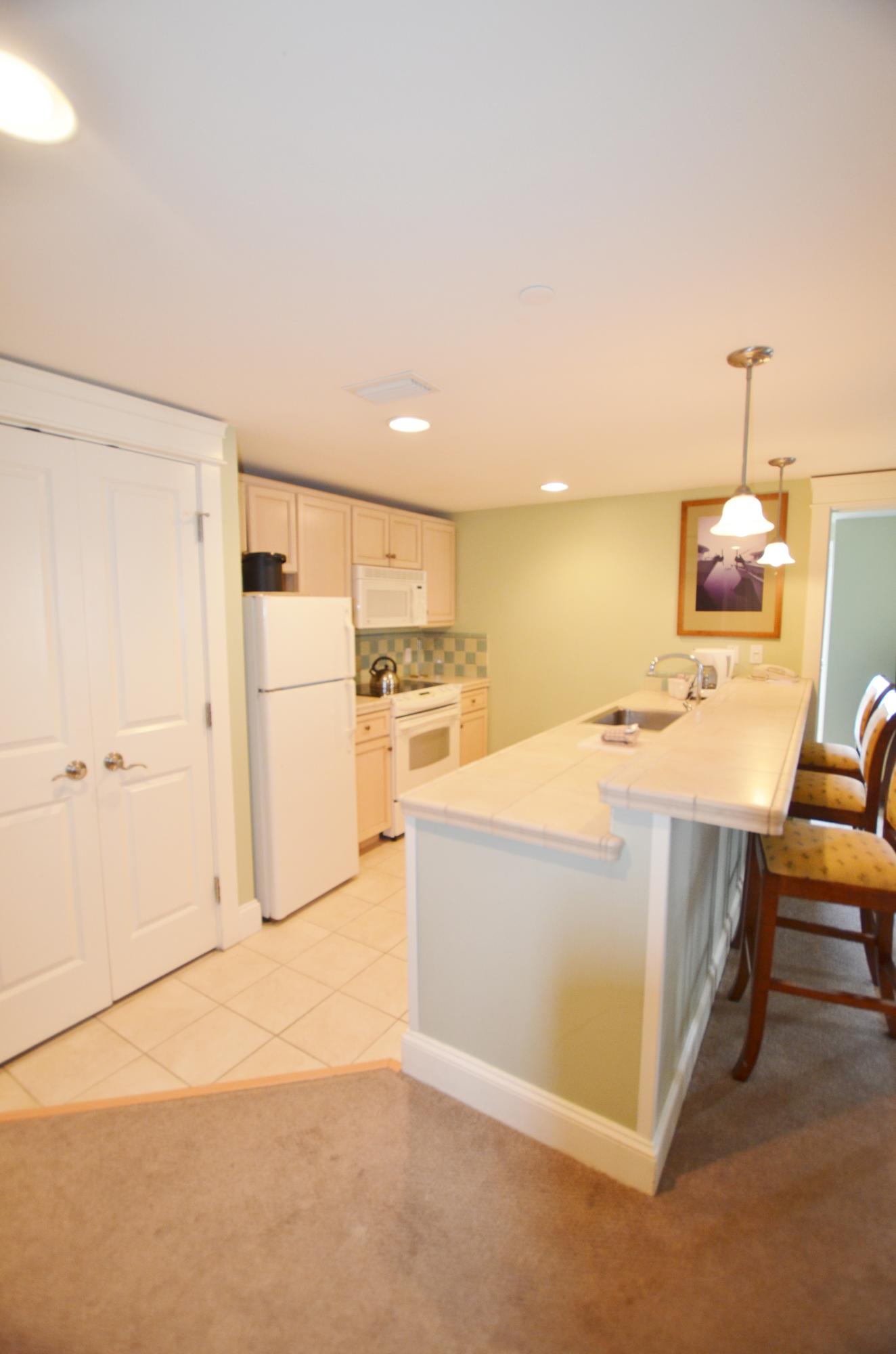 FULLY FURNISHED WITH ALL UTILITIES INCLUDED!! Available for a 6 MONTH LEASE! This spacious true 2 bedroom 2 bath condo on the 5th floor of the Grand Sandestin features Bay Views from the balcony, living room and master bedroom and open floor plan. Come see what all a Resort Community has to offer. Amenities available with the lease of this home (for a one-time, $150 administrative fee per lease term) are daily kayak, bike and boogie board rentals, daily tennis court time, fitness club access (with spa and steam rooms), access to the resorts four pools, and discounts on golf and beach set-ups. This is in addition to any amenities specific to this property's neighborhood and is an exclusive offering with this listing.