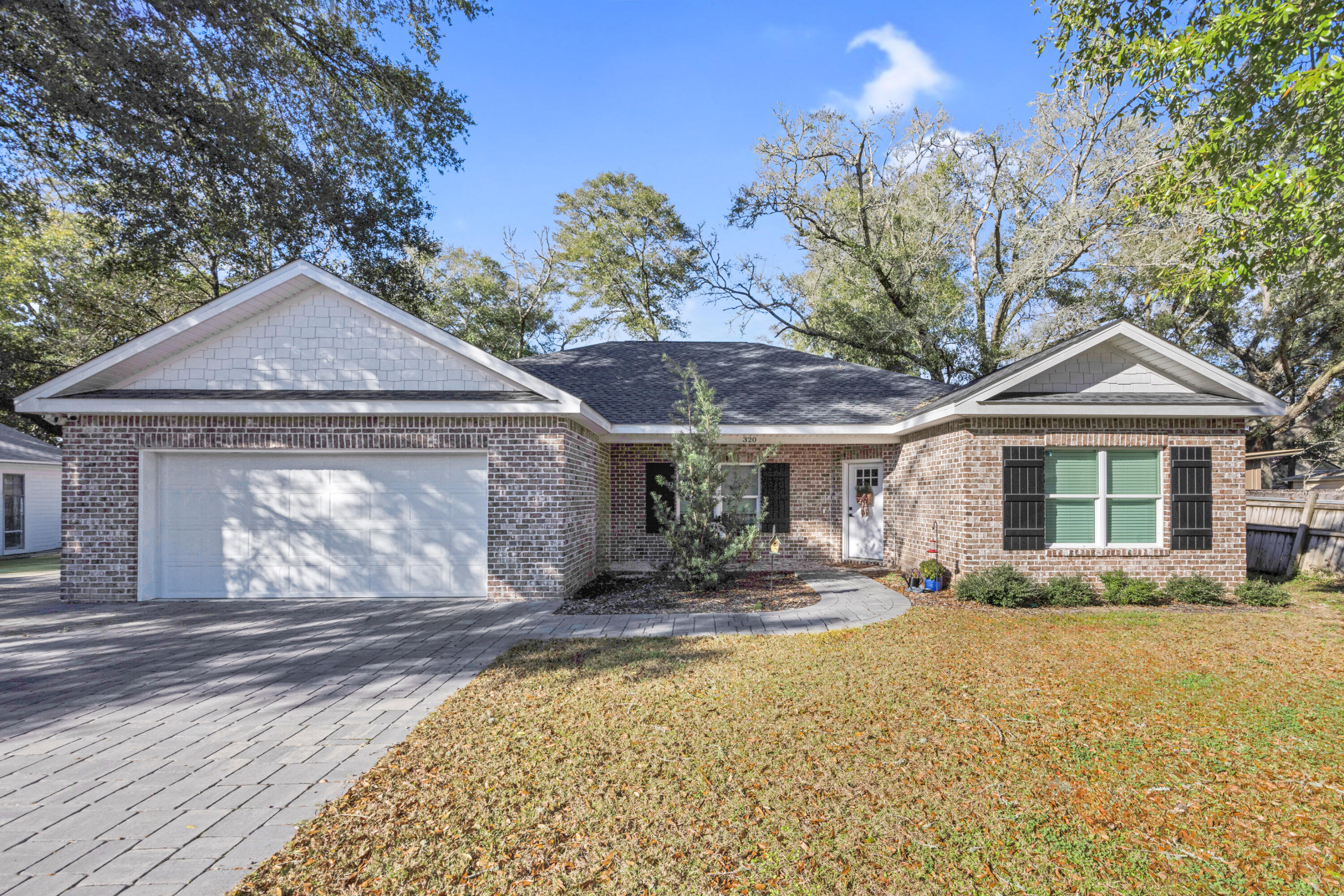 SELLER TO OFFER UP TO $10,000 IN CREDIT TOWARD BUYER CLOSING COSTS/RATE BUY DOWN!! Welcome to your beautiful new home, where thoughtful design meets one of Niceville's most convenient locations. This is the kind of home that quietly over delivers. No HOA, beautifully finished, and designed for real life!

This move-in ready home features an open floor plan ideal for everyday living and entertaining, along with a split bedroom layout that provides privacy for the primary suite. The kitchen offers a large walk-in pantry, ample cabinetry, stainless steel appliances, and a functional layout that connects seamlessly to the main living and dining areas. Walk-in closets throughout the home provide generous storage, and the laundry room includes a washer and dryer that convey with the sale. The primary suite is spacious and practical, featuring a large walk in closet and a well appointed en suite bath. Three additional bedrooms allow flexibility for guests, home office, or family living. The garage includes an EV charger and attic storage for added convenience. Outside, the paver driveway and paver patio add curb appeal and usability, while the partially fenced backyard offers a low maintenance outdoor space for relaxing or entertaining.

Location truly sets this home apart. Just about 10 minutes from Eglin Air Force Base and the EOD School, it offers a convenient commute. Zoned for highly rated Niceville schools and surrounded by parks, playgrounds, and everyday conveniences, the setting is ideal for daily living. Beaches, shopping, and dining are only a short drive away, making this a perfectly positioned home for full-time residents.