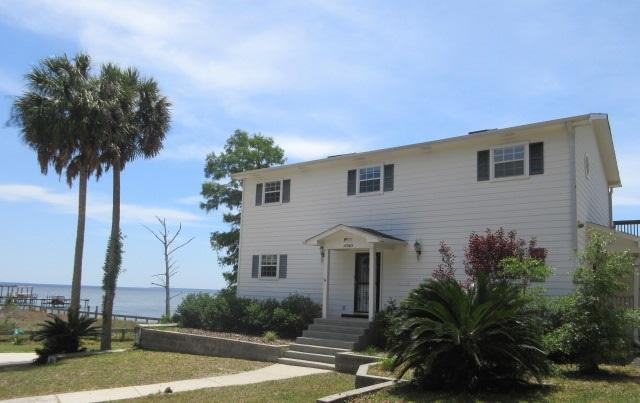 WOW, what a view of the Choctawhatchee Bay! The location of this 3 bedroom, 3 bath Bay front REO home could not be any better! The home also has a bonus room upstairs for numerous uses, an office on the first floor, beautiful huge decks and views from all the bedrooms.