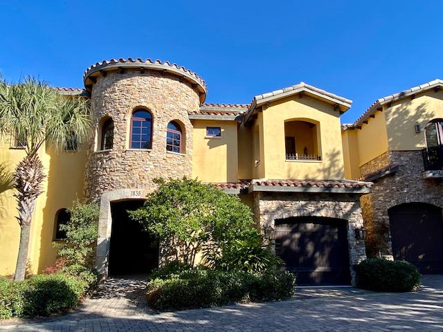 This Tuscan themed Townhome is gorgeous and directly on the Golf Course. This home is large and the interior  boasts custom trim work and upgrades throughout. This one will not last long with inventory this low. Call today for your showing
