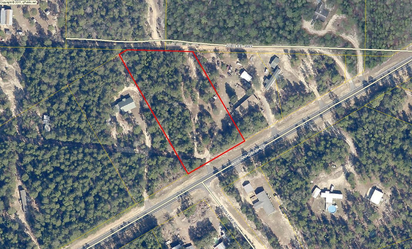 Vacant 2.2 acres, utilities available. 216 ft frontage on Highway 393, lot appears level and is partially cleared. No improvements have been made to the property