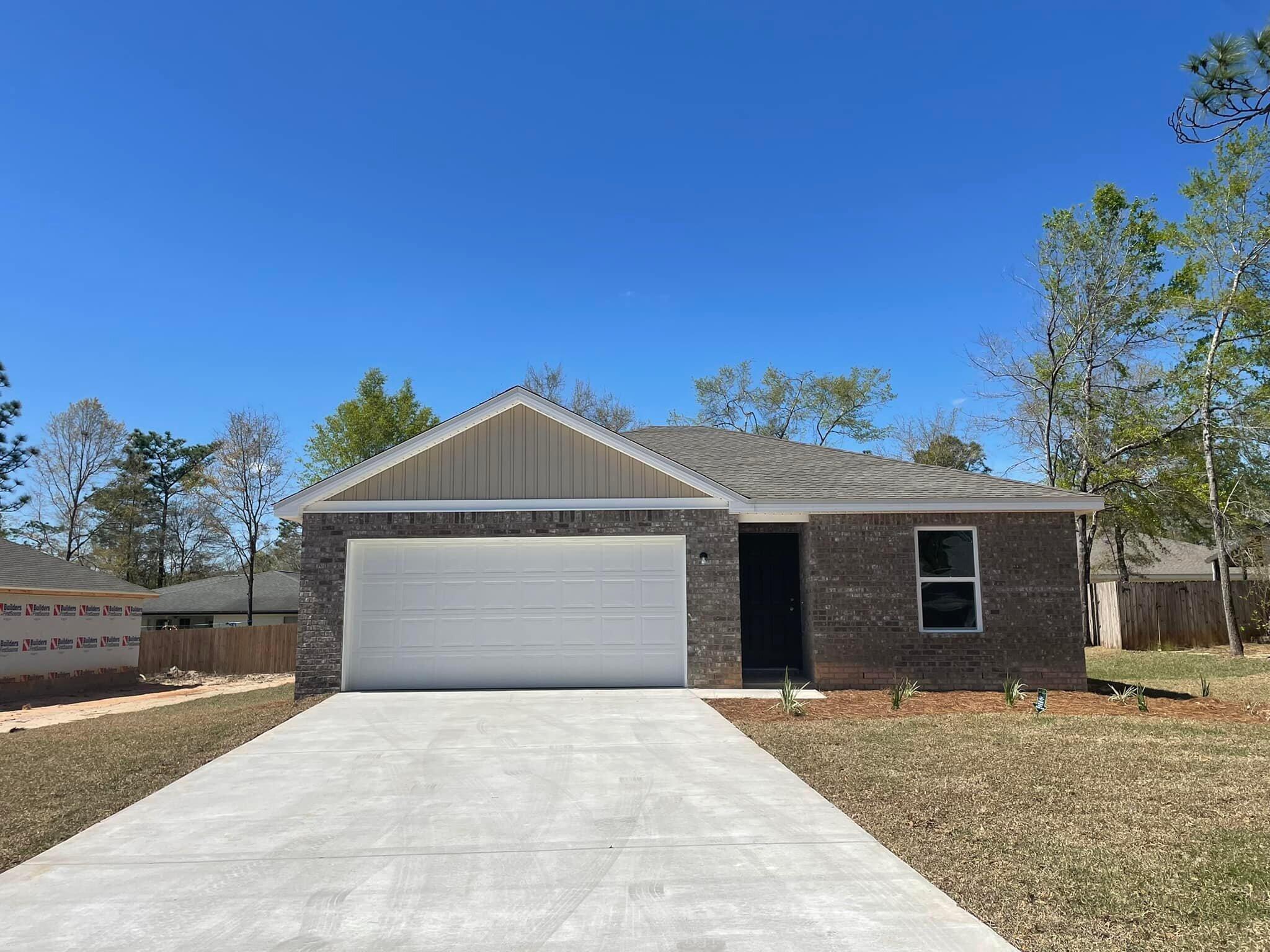Brand new construction finished March 2022! You will be the first ones to live here! Four bedroom, two bathrooms with right at 1400 sq ft in the beautiful community of Hunters Ridge within walking distance to Walton High School and Maude Saunders Elementary. This home features an open floor plan with an easy flow. The well-appointed kitchen has gorgeous cabinets and granite countertops and stainless steel appliances (range with microwave and dishwasher included but refrigerator is not). The primary suite has an en-suite bathroom, dual sinks and a walk in closet. This home is centrally located to all that DeFuniak Springs has to offer.
