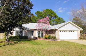 Close to the 7th Group Complex and Duke Field with an easy commute to Eglin AFB. Three-bedroom two bath home features an open split floor plan. Living room boasts vaulted ceiling, plant ledges to display collectibles, wood burning fireplace, surround sound wiring with sliding glass doors leading to the patio.The kitchen features plenty of countertop space to include an island, Italian tile flooring, and newer stainless dishwasher and refrigerator. The large breakfast nook area overlooks the nicely landscaped back yard. All windows upgraded to Pella Impervia/Thermastar. Phantom screens on living room patio and both garage entry doors. Large master bedroom with beautiful Pergo laminate

The master bath comes with a double vanity, updated faucets and his and her closets. Upgraded ceiling fans