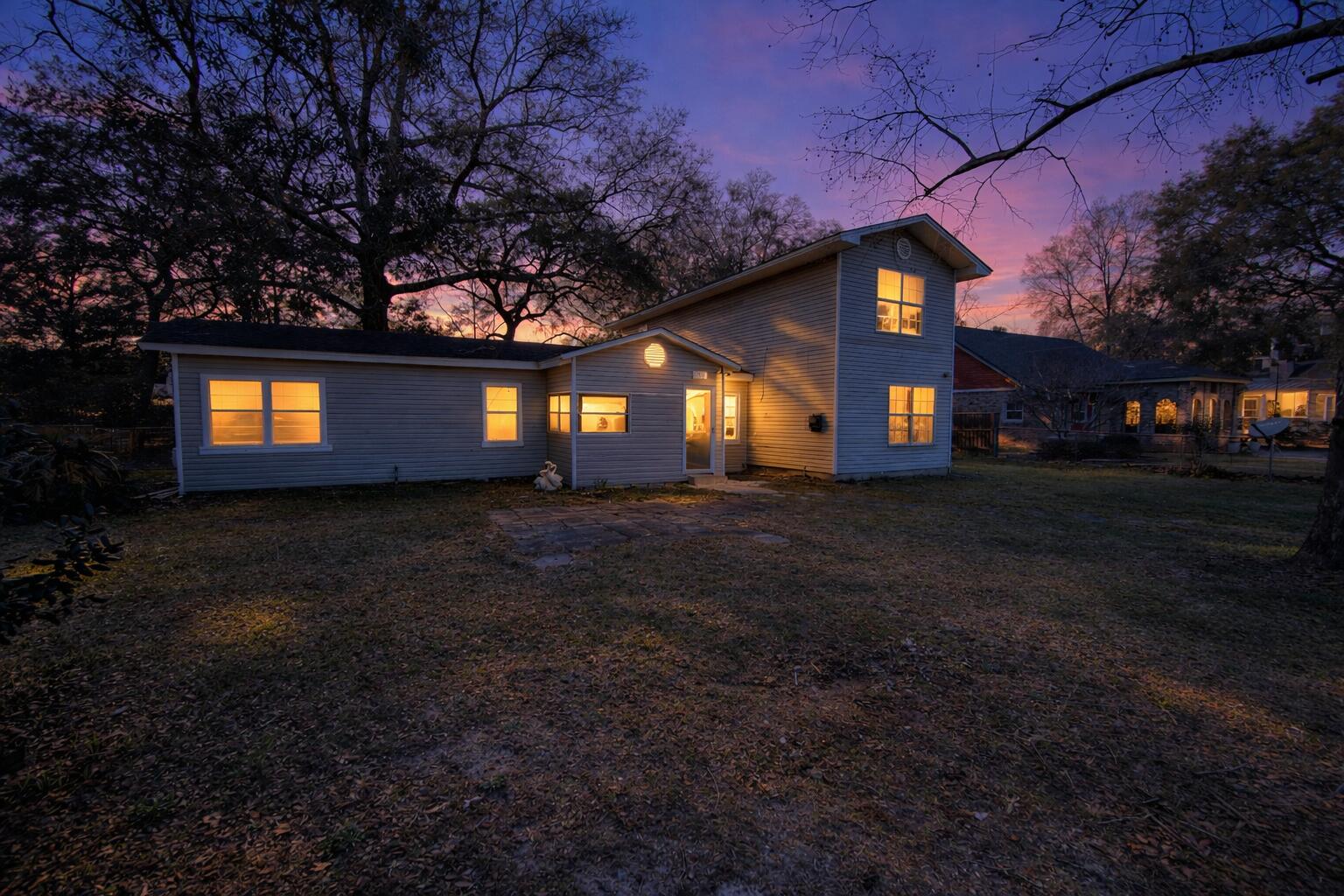 This home has great bones and even better potential.

From the moment you walk in, you'll notice the warm wood-look flooring, natural light pouring through the windows, and a layout that simply makes sense. The living spaces feel open and inviting, with multiple bedrooms offering flexibility for family, guests, or a home office setup. The galley-style kitchen provides plenty of cabinet storage and workspace, while the bathrooms are functional and ready for your personal touch.

Upstairs, the additional rooms and hallway create separation and privacy, making the floor plan both practical and livable. Natural light throughout the home gives each space a bright, airy feel.

That said, this is a home that's ready for someone to make it their own. A little cosmetic updating and vision could tru ly transform it into something special. Whether you're a first-time buyer looking to build sweat equity or an investor searching for your next opportunity, this property offers solid value and room to grow.

With the right updates, this house could shine. It's not just a place to live -- it's a place to create something that feels uniquely yours.