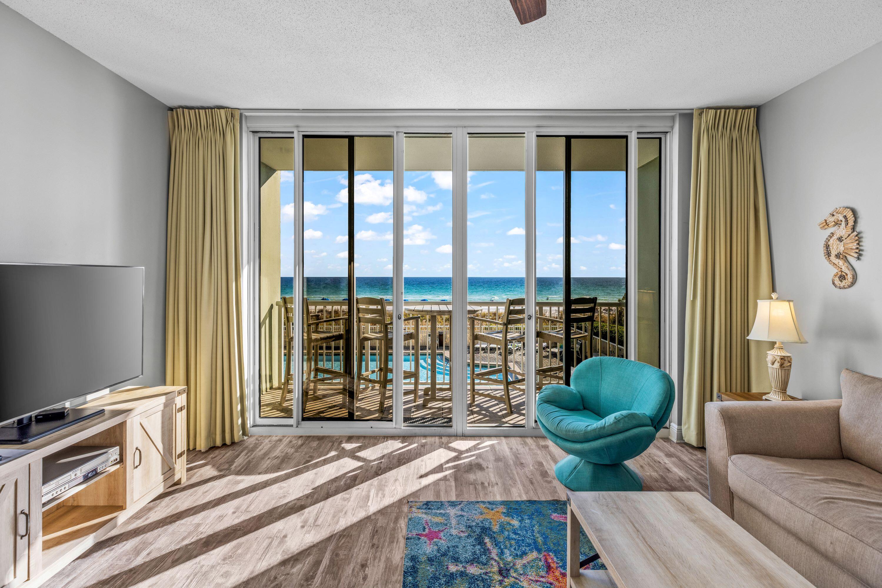 Take advantage of a rare opportunity to own a 1 bedroom in Waters Edge Condominiums. The view from the living room is pure paradise with an unobstructed view of the beautiful Emerald Waters of the Gulf of Mexico. Enjoy breathtaking views of the sunset from the spacious balcony. Take a dip in the picturesque, heated beachfront pool, or enjoy the fully equipped fitness room! In addition to the one bedroom, unit 208 also has a bunk area with 2 bunks as well as 2 spacious bathrooms.  Tastefully decorated throughout with a nice ''beachy'' vibe, hard surface countertops, and new LVP flooring in the bedrooms and living room. Covered parking, 2 pools, BBQ grills and picnic area are just a few of the many ammenties Waters Edge has to offer. You do not want to miss this one!
