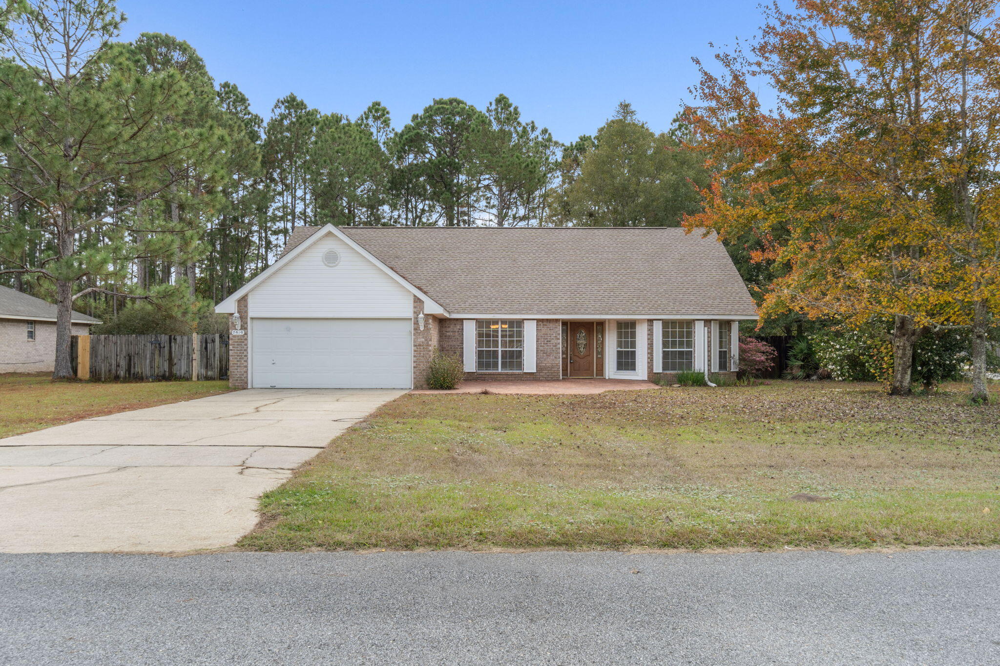 Great deal on an oversized 0.55 acre corner lot in the popular neighborhood of Holley by the Sea! Have peace of mind with a new roof just installed in October 2022 and a 2017 water heater. This two story Whitworth floor plan features 4 bedrooms (two downstairs to include the master and two upstairs with a loft), 3 bathrooms, along with a formal dining room AND separate office/flex room! The living room has soaring vaulted ceiling and wood burning fireplace, and the kitchen is a great space with an eat-in area as well as a kitchen island, plenty of counter space, and a pantry. Downstairs is the master bedroom showcasing a walk in closet and a bathroom with double vanities as well as a soaking tub and separate shower. On the other side of the downstairs down its own hallway is a private bedroom and its own full bathroom. Off the living room is a large screened in back lanai which leads to a massive patio, both of which together span the entire width of the house overlooking the private retreat of a backyard. Upstairs you'll find two bedrooms with a shared full bathroom between them, and off one of the bedrooms is a massive storage area. The nice sized loft overlooking the living room is another fantastic space in this sprawling 2450sqft home complete with an interior downstairs laundry room and a two car garage. Enjoy all the amenities that Holley by the Sea has to offer in their multimillion dollar recreational facilities! Welcome home!