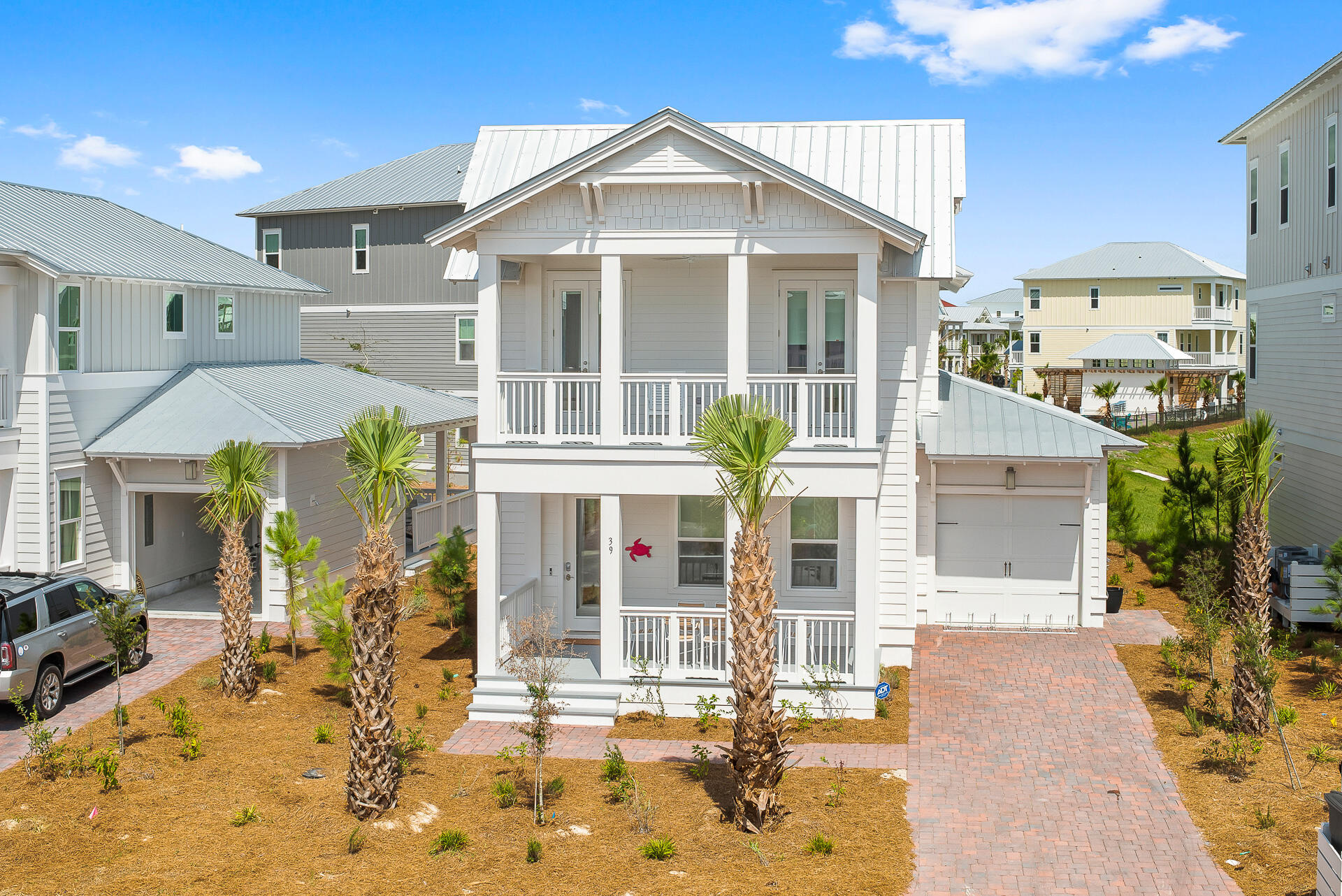 Highly desirable,TURNKEY, Maldives plan in the boutique beach community of Prominence, located south of 30A. 
This cozy beach bungalow boasts 4 bedrooms and 3.5 bathrooms on two levels. The first level features an open kitchen and living room floor plan that enjoys plenty of natural light and sunshine throughout the day. The chef's kitchen is equipped with stainless appliances, gas range, and quartz countertops. The bunk room  is spacious enough for a twin-over-twin bunk accompanied by another twin with trundle. Just down the hall is the first primary suite. The primary bath includes walk-in shower and double vanities. The second level boasts a second primary suite with private balcony and an en-suite bathroom that features a walk-in shower and double vanities. Across the hall are matching queen bedrooms and a shared bath. The second level also is complimented by a spacious laundry room. There's an attached garage for your favorite beach vehicle and plenty of room in the driveway for family or guests. Relax in a rocking chair on the back porch and enjoy a view of the resort-style community pool. 
The Town of Prominence is located on 30A between Watersound and Alys Beach. Residents enjoy easy access to The Hub,the trendy town center, resort-style pools, a fitness center, and a private shuttle to the beaches of 30A. The Hub boasts beach-urban restaurants, shops, and an amphitheater for movies, concerts, and events.