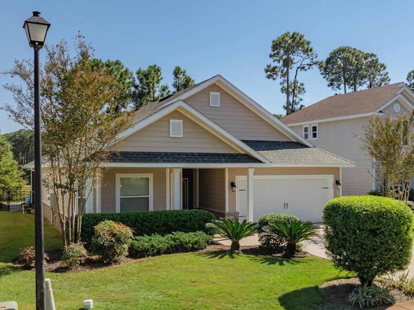 Under contract w/contingencies. Back-up offers are welcome. Updated and ready to sell!  This immaculate 4BR-2BA home is located on a picturesque pond in Driftwood Estates.  A few of the tasteful upgrades include new LVP flooring, new kitchen appliances, custom bathroom tile, new light fixtures and a new HVAC system. With 1,980 sq, the floor plan provides generous space for easy living. The home offers an oversize kitchen with an island, bar seating, SS appliances, a shelved pantry and a built-in desk.  There is a separate dining room, and the living room opens through French doors to a screened porch. The primary bedroom features a lovely bay window and a newly tiled ensuite bathroom with a soaking tub, separate shower and wood shelved walk-in closet.  The fenced backyard offers peaceful views of a pond and mature trees.Home is being sold unfurnished, but window treatments and hurricane shutters are included. Driftwood Estates has a community pool, community room and fishing in its numerous ponds. A recreation park is within a mile and includes a soccer field, basketball courts, pickle ball, tennis, playground, picnic area and walking track. This lovely home is ready for immediate occupancy and priced to sell.