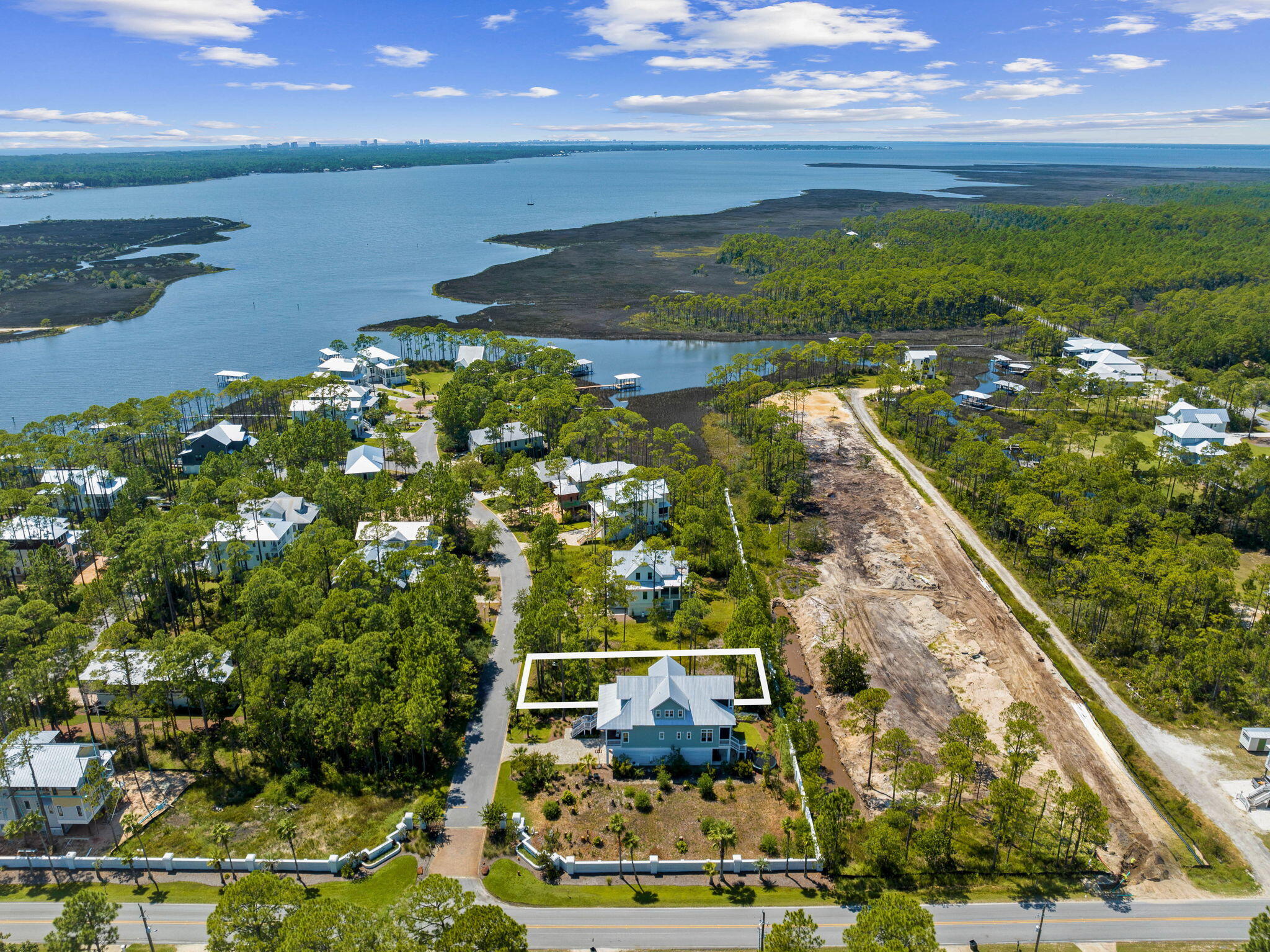 This unique homesite, located at I-3 Mallard Lane in the gated community of Cessna Landing, offers a rare opportunity to build your dream home in one of Santa Rosa Beach's coveted bayfront neighborhoods. Nestled just minutes from the beaches of 30A and only two miles north of the intersection of Highway 393 and U.S. Highway 98, this private enclave of just 49 homesites blends coastal tranquility with convenient access to shopping, and dining. You can enjoy direct access to Charles E. Cessna Landing — a county-maintained boat launch and waterfront park adjacent to the community. Whether you're an avid boater, fisherman, or paddleboarder, this location is ideal for the bay lifestyle  and exploring the scenic waterways of Northwest Florida. Spend your mornings kayaking through the serene inlets or enjoy an afternoon cruise across the open bay  it's all just steps from your front door.

In addition to bay access, homeowners also enjoy exclusive use of a community pool and private dock area, perfect for gathering with neighbors or enjoying the sunset after a day on the water.

Whether you're seeking a permanent residence or a second home to embrace the boating lifestyle, this homesite is a rare find.