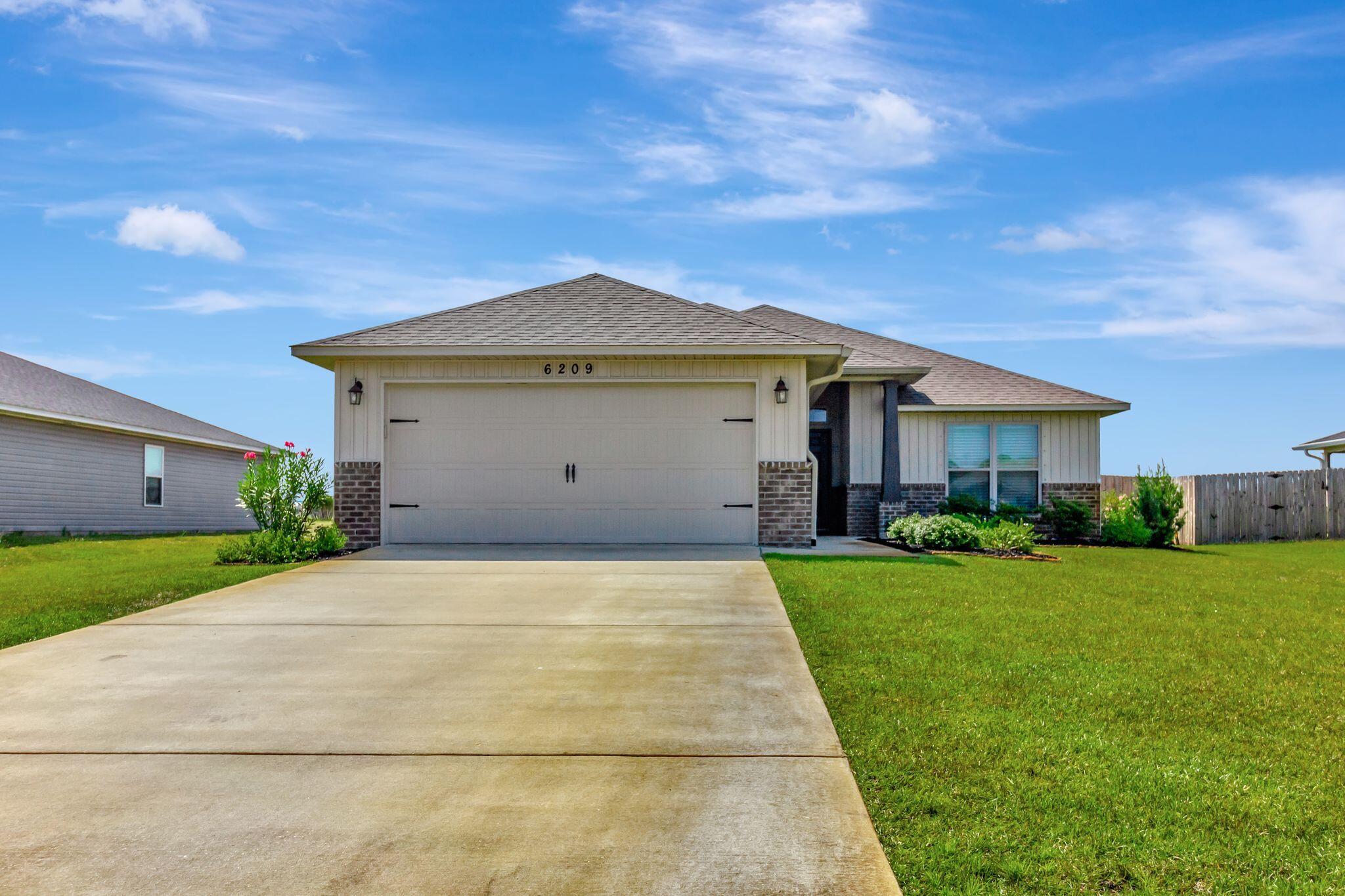 Welcome to Heather's Place, a master-planned community from Henry Homes. This charming cottage-style ranch home community boasts beautifully sodded yards, sidewalks, and underground utilities. Enjoy the convenience of public water and sewer, with easy access to shopping, schools, and just 8.5 miles from Navarre Beach!

As you step inside, you'll be greeted by an inviting open floorplan that seamlessly blends the living, dining, and kitchen areas. The heart of the home boasts stunning granite countertops in both the kitchen and bathrooms, complemented by sleek undermount sinks that elevate the overall aesthetic.

The kitchen features top-of-the-line stainless steel appliances, granite countertops and a breakfast bar separating living area and kitchen; perfect for either a quiet meal or entertaining guests! 

Upgraded LVP flooring flows through the common and wet areas, adding a touch of sophistication, while plush carpet in the bedrooms creates a warm and inviting retreat at the end of the day.

The primary suite is a true sanctuary. It showcases an ensuite bath with soaking tub, separate tile and glass shower and large double vanity that adds a spa-like feel to your daily routine. 

Step outside to the covered back porch, where you can unwind and enjoy your favorite outdoor moments in your privacy fenced back yard. Sip your morning coffee or host friends for a barbecue. You will have plenty of space for everyone!

This home is not just a place to live; it's a lifestyle waiting to be embraced. Don't miss the chance to make it yours!

No smoking or vaping. Dogs may be allowed with some breed and size restrictions and a $400 non-refundable pet fee.

FEES: $50 per adult 18+ application fee, Landlord Liability Policy (if proof of Renter's coverage is not provided) $15 mo, Pest Assurance pest control policy $20 mo.