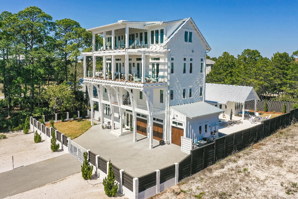 The best priced property on 30A offering these unique and truly unobstructed ocean views. This Geoff Chick design features a self-sufficient guest house, an outdoor sauna, a natgas power generator, and ample entertaining space. The four level estate boasts breathtaking panoramic views of the Gulf, sand dunes, and Stallworth Lake. Be sure to click on the video tour! Nestled in a very quiet, little-known neighborhood adjacent to Topsail Hill Preserve on the West side of 30A , the home offers privacy and tranquility afforded by its oversized lot and perimeter gated fence. Enjoy these amazing views away from the beach crowds and traffic. Beach access in a 2min golf cart or a 6min bike ride. No HOA. If you are looking for value in this market, this is it.