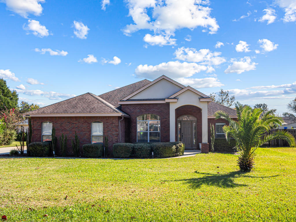 Modern, efficient, and full of upgrades—this Destin home has it all, AND there's no HOA! Step inside to an open layout with a split bedroom floorplan, tall ceilings and stylish California LVP flooring throughout. The kitchen features granite countertops and a gas range. A tankless water heater keeps the hot water flowing. Smart home touches—keyless entry, a smart thermostat, and hidden TV wiring in every bedroom and the living room—add everyday convenience.
Out back, enjoy a fully fenced yard and a covered patio already prepped with a gas line for your dream outdoor kitchen or hot tub. The property also offers rare flexibility with two garages: an attached garage with EV-charging capability and a detached garage with extra storage, a 240V outlet, and its own heating and cooling.
