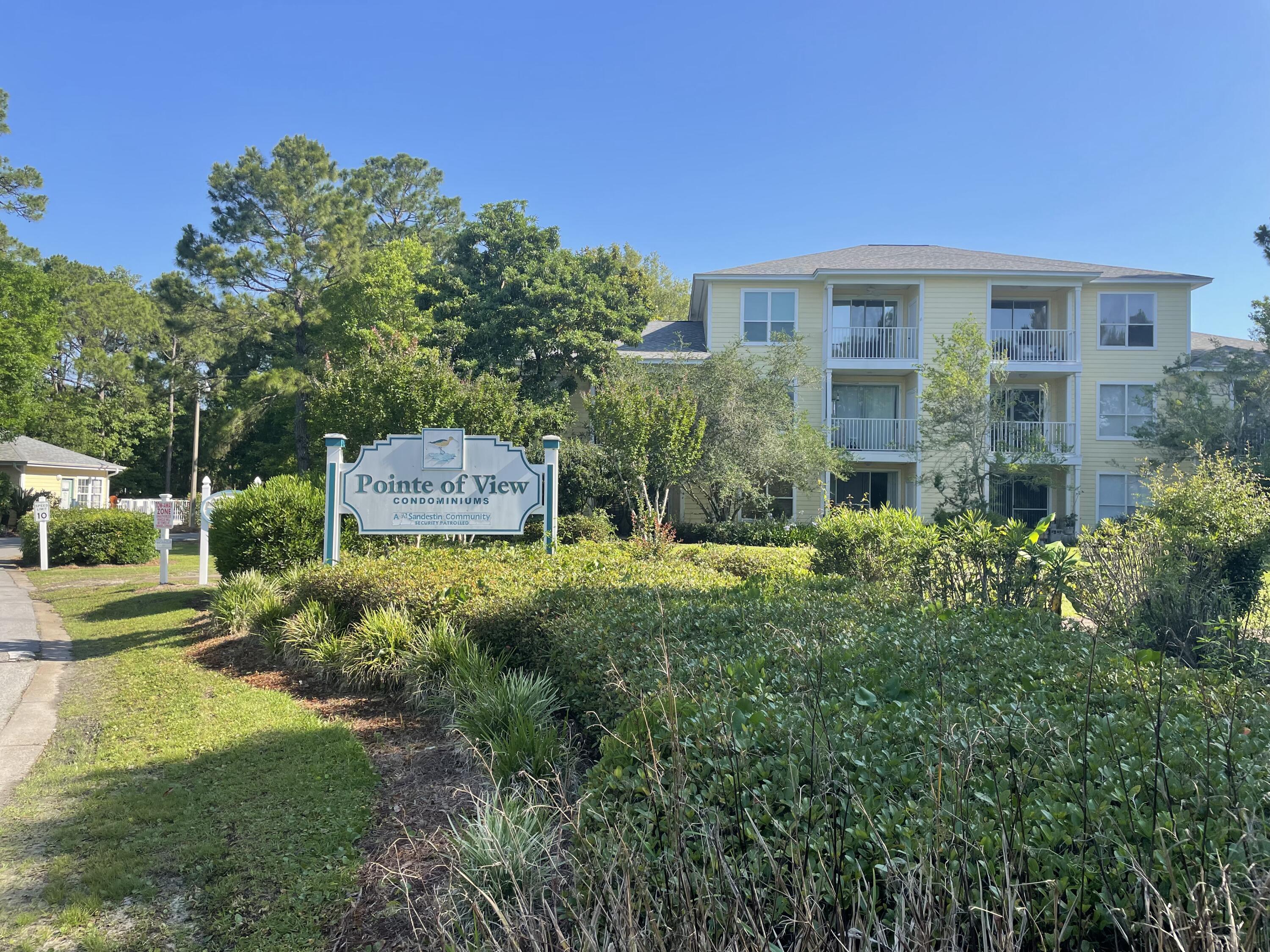 TOTALLY UPDATED 2 BED/2 BATH CONDO RENT READY FOR THE SUMMER SEASON.  SIMILAR UNIT GROSSED $25K IN 6 MONTHS.   9 ft ceilings with no units above makes for spacious, private and peaceful condo. Unit comes furnished with full price offer.  There has been no detail missed.  Updates include: Soft close kitchen cabinets, counters, appliances, luxury vinyl plank flowing throughout, porcelain tile on the patio, bathroom vanities, tile work, popcorn ceiling removed, shelves installed in owners closet, and a new hot water heater.  The unit is nestled in the quiet Pointe of View Condominiums within minutes to 30A, Grand Boulevard entertainment district, the beaches in Miramar, 30A, Destin and the Silver Sands outlet center. Come see why this unit is the one you want at Pointe of View!