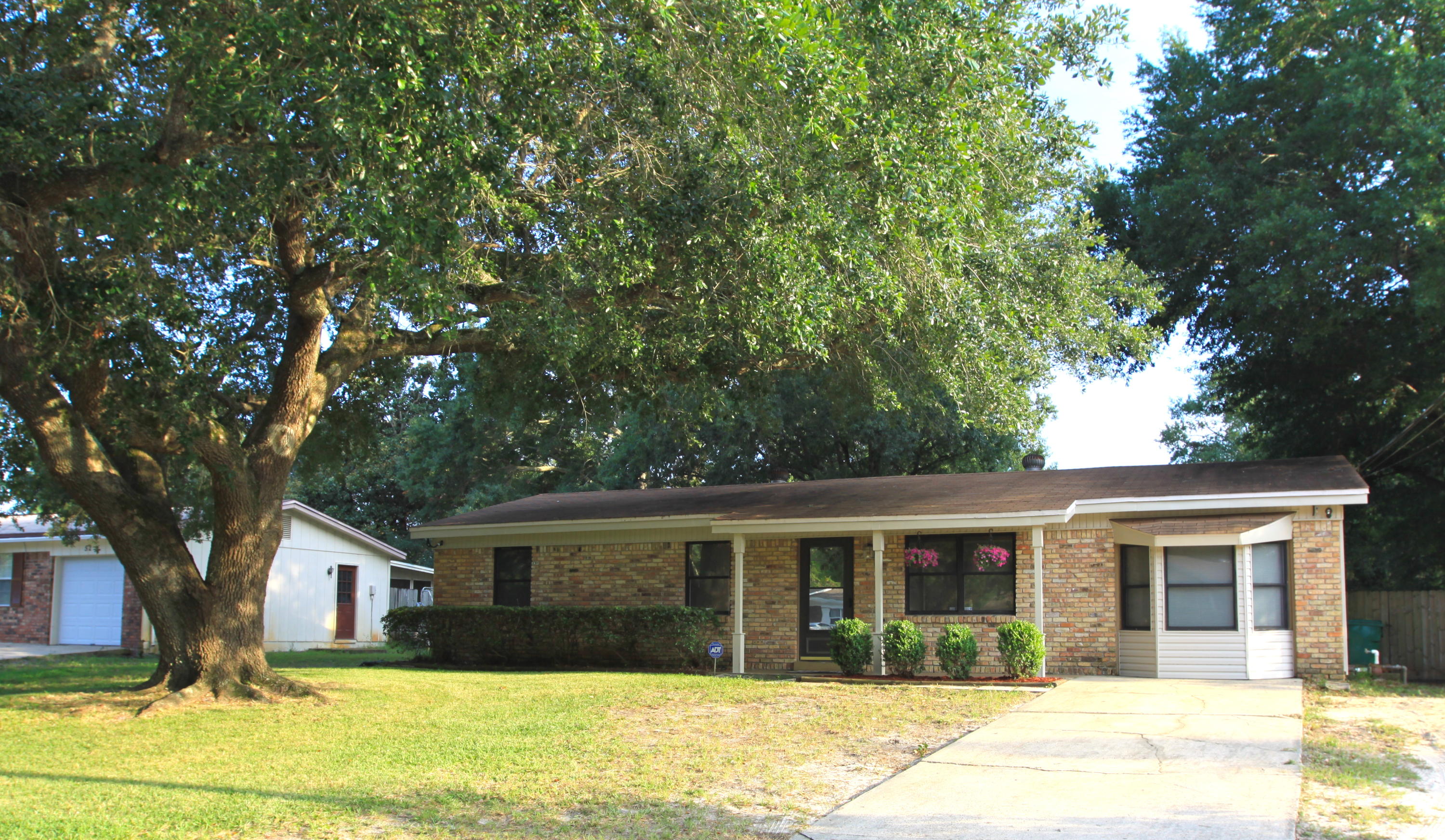 UPDATES THROUGHOUT! This charming Mary Esther home, perfectly nestled within a familial neighborhood, features shiny stainless steel kitchen appliances, a family room with built in book selves and a bay window, an indoor laundry room and tile and laminate flooring throughout. You will live near A+ rated schools and Hurlburt Air Force Base with only a short drive to shopping, dining, entertainment and the beautiful beaches along the Emerald Coast. The main bathroom was recently updated with new tile in the shower and a fresh coat of paint. Additional Updates and improvements include: a new water heater, HVAC system, exterior laundry room door and posts for the front porch. Wind Mit incuded. All measurements must be verified by the Buyer.The laundry room is awaiting a fresh coat of paint.