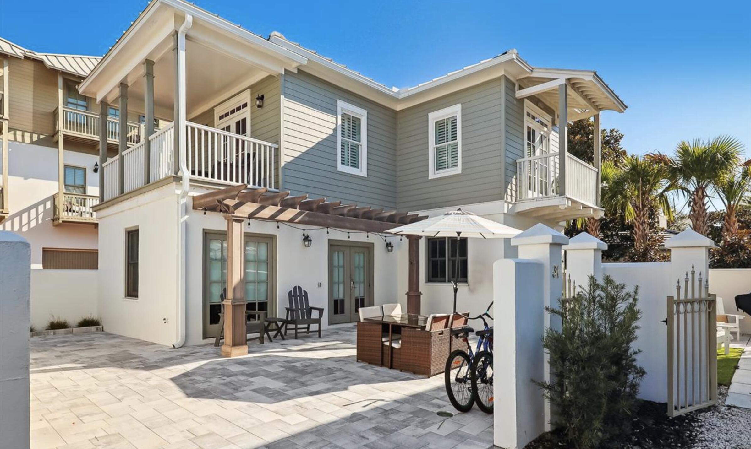 Located south of 30A in the gated Sunset Beach community, this upgraded 2-bedroom, 3-bath home is a perfect beach retreat, just steps from the beach and walking distance to Alys and Rosemary Beach. Sold fully furnished and rental-ready, it offers 1,230 square feet with an open floor plan and a private courtyard that extends the living space. Recent updates include a new HVAC (2022), new paint, refinished wood floors, new pavers, rain gutters, and a new washer/dryer all in 2023. The kitchen has been fully updated with new countertops, backsplash, sink, Bosch dishwasher (2023), refrigerator (2023), stove (2022), and a coffee bar with extra storage, wine fridge, and unique tile backsplash. The first floor features a bright living, dining, and kitchen area, along with a full bath and  convenient laundry. Upstairs, two bedrooms offer en suite baths and private balconies, with the guest balcony offering Gulf glimpses. The newly landscaped courtyard includes outdoor dining, a shower, and parking for two vehicles.

Sunset Beach is a gated community with deeded beach access and a Gulf-front pool. This property is turn-key and ideal as a second home or rental investment.