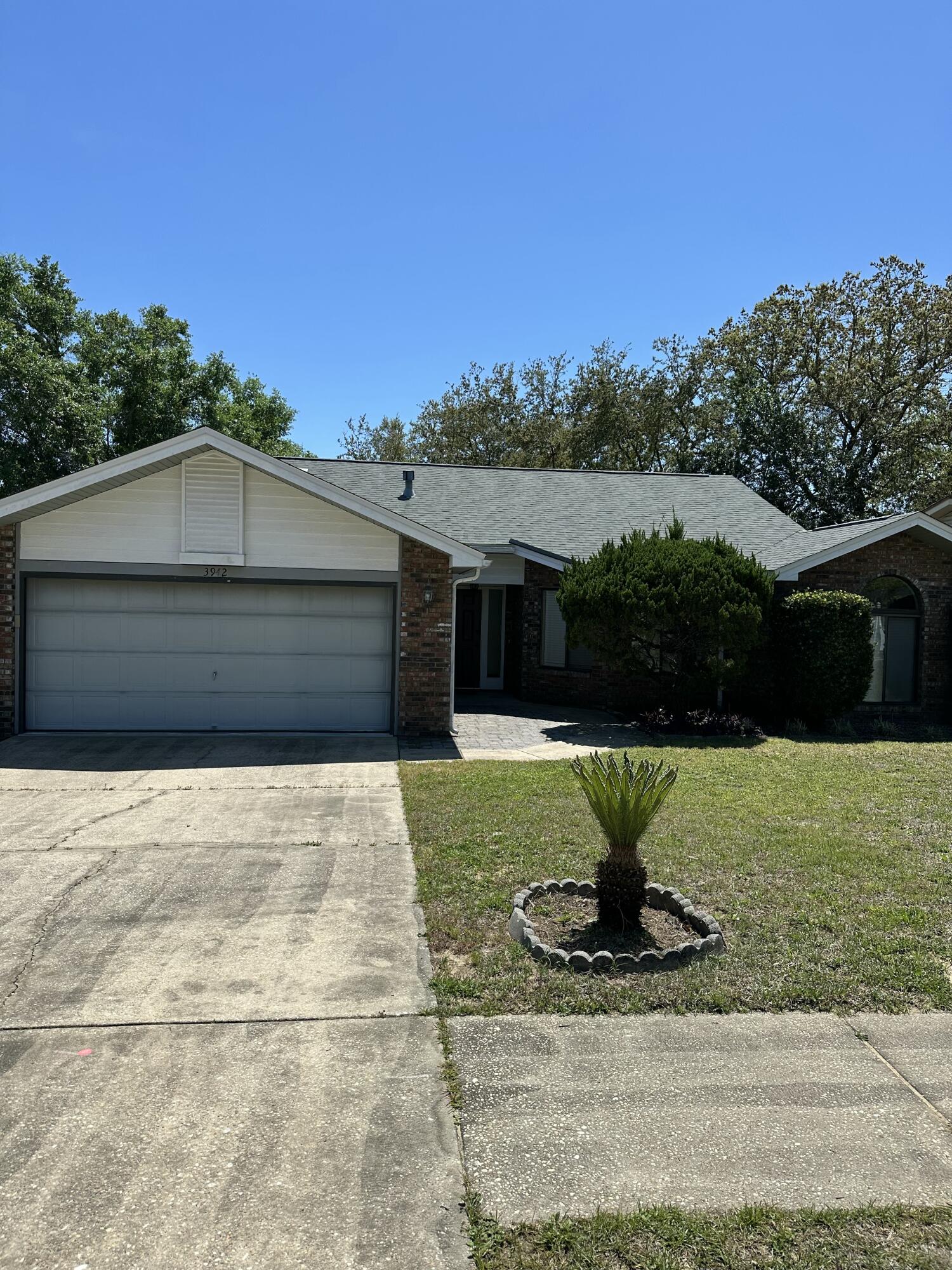 Home in the heart of Niceville, in Cedar Ridge. You are within minutes of our great schools and military bases. Northwest Florida College is just around the corner. Eglin Air Force Base is just a short drive. Duke Field and 7th Special Forces are also just minutes away, opposite the heavy flow of traffic for a great alternative to Crestview. This is a NON-SMOKING home! Entering thru the front door, you are greeted by a nice size den or family room with tiled floor for easy care. It is has an open feeling with a vaulted ceiling, bright and airy. For those cool nights there is a large masonry fireplace, equipped with gas logs for no mess or hassle, nestled in the corner.
