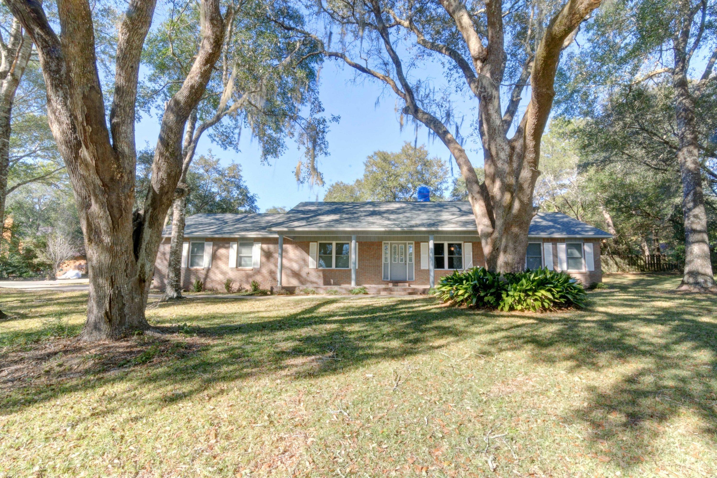 Sprawling ranch sitting on .47acres offers mature oaks in the front yard and very private fenced in rear patio. The living room wood planked cathedral ceiling complements the wood burning fire place for those family gatherings. Well sized dinning room just off the galley style kitchen. A bonus room to the rear makes the perfect play room. The master suit has a amazing two full sized closets and full size bath. on the other end of the home are two very nice sized additional bedrooms with full bath accessible from the hall. If your looking for a family homestead or investment opportunity this home offers Value at $87 a square foot.