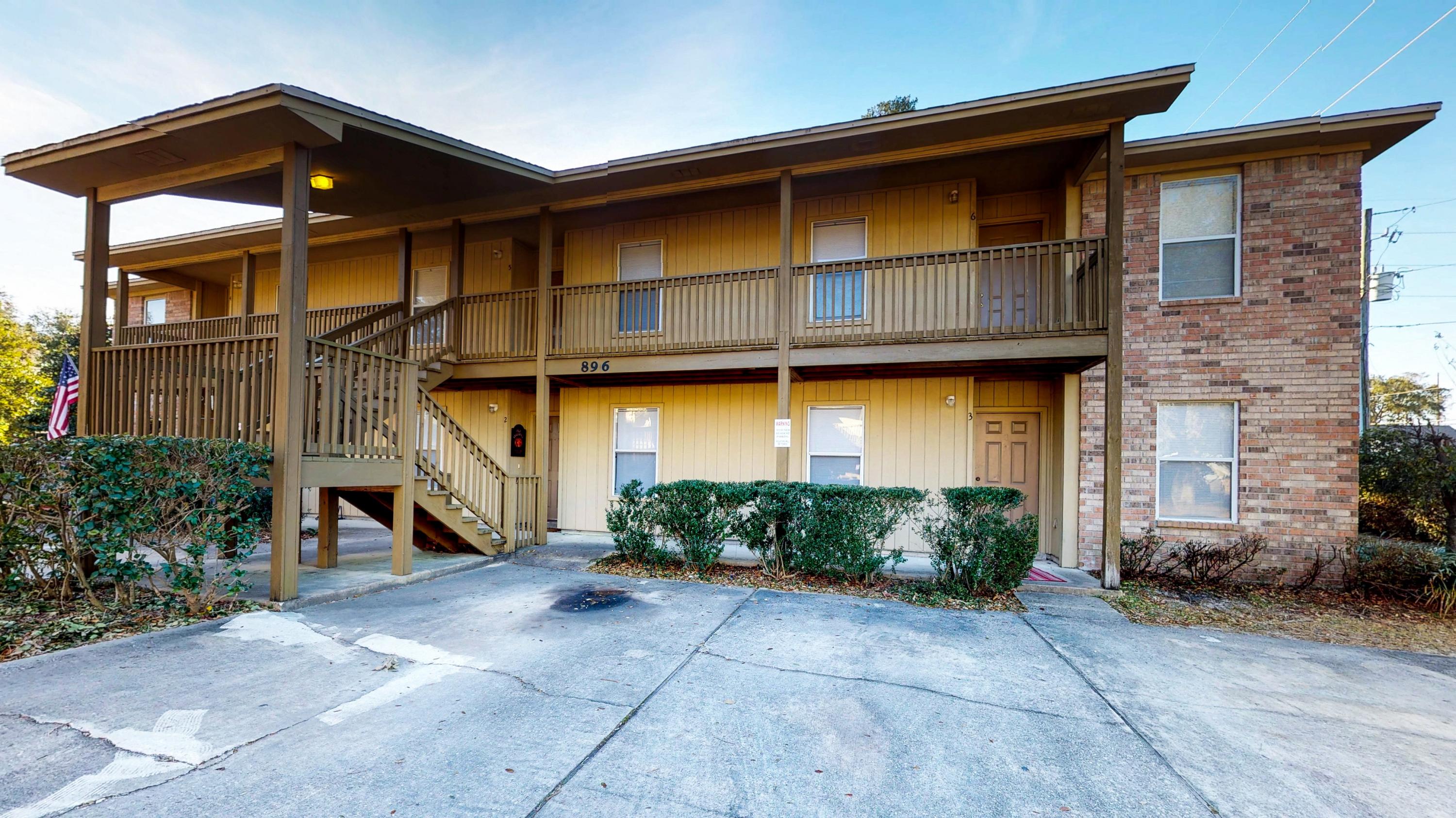 *MOVE IN SPECIAL*Located on the 2nd floor, this very nice and well maintained apartment offers an open floor plan for the living/dining/kitchen areas with an additional breakfast bar.  Apt has carpet throughout with ceramic tile in the 'wet' areas.  You can also enjoy and relax on your covered back porch which also has additional storage.  The unit boasts a split bedroom plan (meaning two bathrooms between both bedrooms!).  Pest control is provided but sorry, no pets or grills allowed.  All Coastal Realty Services residents are enrolled in the Resident Benefits Package (RBP) which includes renters insurance, HVAC air filter delivery (for applicable properties) and our best-in-class resident rewards program, and much more! More details upon application.