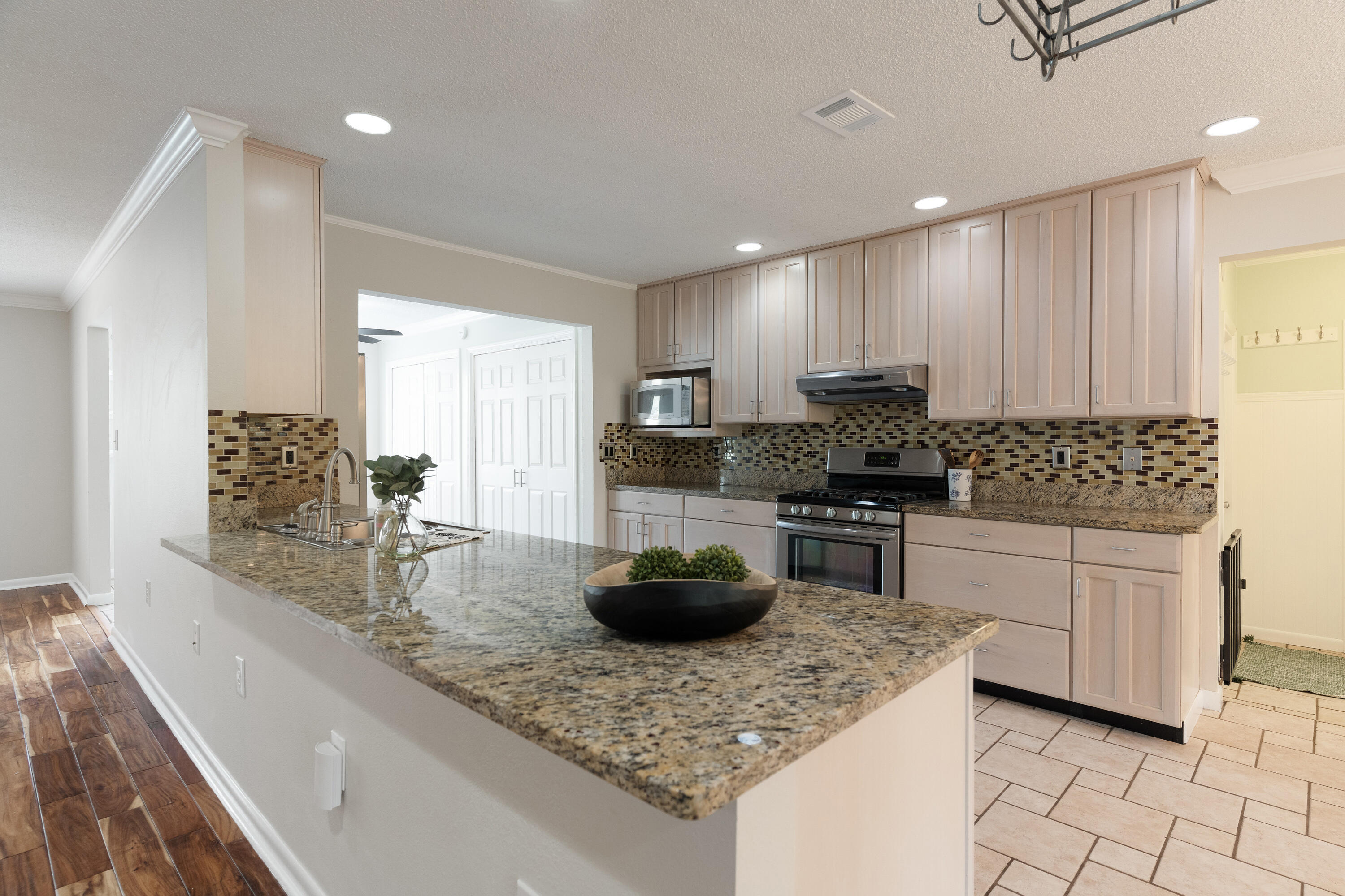 Don't miss this charming home in the highly sought-after Lake Lorraine Estates with a 20 minute drive to Hurlburt Field and approximately 10 minutes to Eglin AFB, schools, the post office, baseball fields, and more. This beautiful property sits in a well-established and welcoming neighborhood.

Inside, you'll find a spacious yet inviting layout filled with natural light. The family room features a stunning brick-framed fireplace—perfect for cozy evenings. The large kitchen offers gorgeous granite countertops, bleached wood cabinetry, and a stylish glass tile backsplash, making it both functional and beautiful.

The master suite includes a generous walk-in closet and a private bathroom with a fully tiled walk-in shower.  Two additional bedrooms share a stylish full bath complete with a classic clawfoot tub and modern finishes. A versatile bonus room located just off the garage entry can serve as a home office, fitness room, or hobby space. Additional features include washer/dryer hookups, ceiling fans in every bedroom, and a spacious backyard ideal for summer barbecues and outdoor fun. Along with a double car garage, guest parking, RV/ Boat Parking, and outdoor storage! Truly a gem!