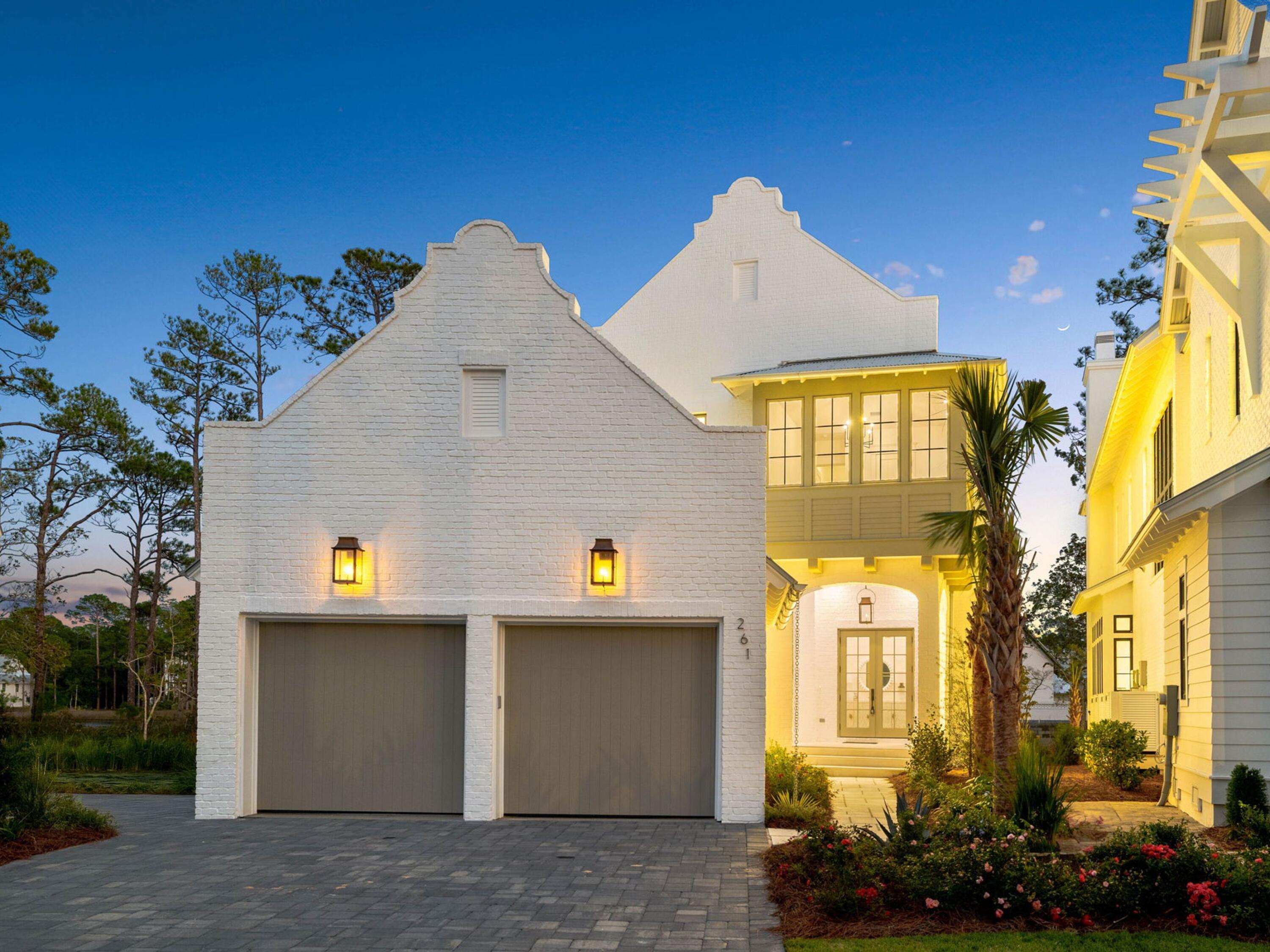 Nestled within the prestigious Churchill Oaks community, this newly constructed home offers a perfect balance of modern elegance and peaceful waterfront living, with serene bayou views and exclusive access to a private marina. This rare combination of luxury and convenience is ideal for those seeking the best of both worlds.

The open-concept design seamlessly blends style and function, with soaring 12-foot ceilings on the first floor and striking custom wood details, including rustic white oak beams and nickel-gap walls. The chef-inspired kitchen is a true highlight, featuring White Oak cabinetry, Taj Mahal countertops, and professional-grade appliances, including a 48-inch Wolf dual-fuel range with griddle and a 48-inch Sub-Zero refrigerator/freezer. A butler's pantry with an additional dishwasher makes entertaining effortless.

The expansive living area opens effortlessly to the outdoor space through 10-foot Eurowall slider doors, creating an ideal flow for indoor/outdoor living. The private outdoor oasis features a pool, fire pit, and a fully equipped outdoor kitchen, perfect for relaxing or hosting gatherings while enjoying the tranquil bayou surroundings.

The master suite serves as a serene retreat, complete with a vaulted ceiling, private screened porch, and a luxurious bath. A second-floor sitting area and office provide flexible spaces for work or leisure, while an elevator ensures easy access to all levels.

Conveniently located just minutes from the vibrant 30A corridor, this home offers access to pristine beaches, world-class golf courses, upscale dining, and charming boutiques. With the added benefit of being part of an exclusive community, this property is the perfect blend of privacy, convenience, and coastal luxury.