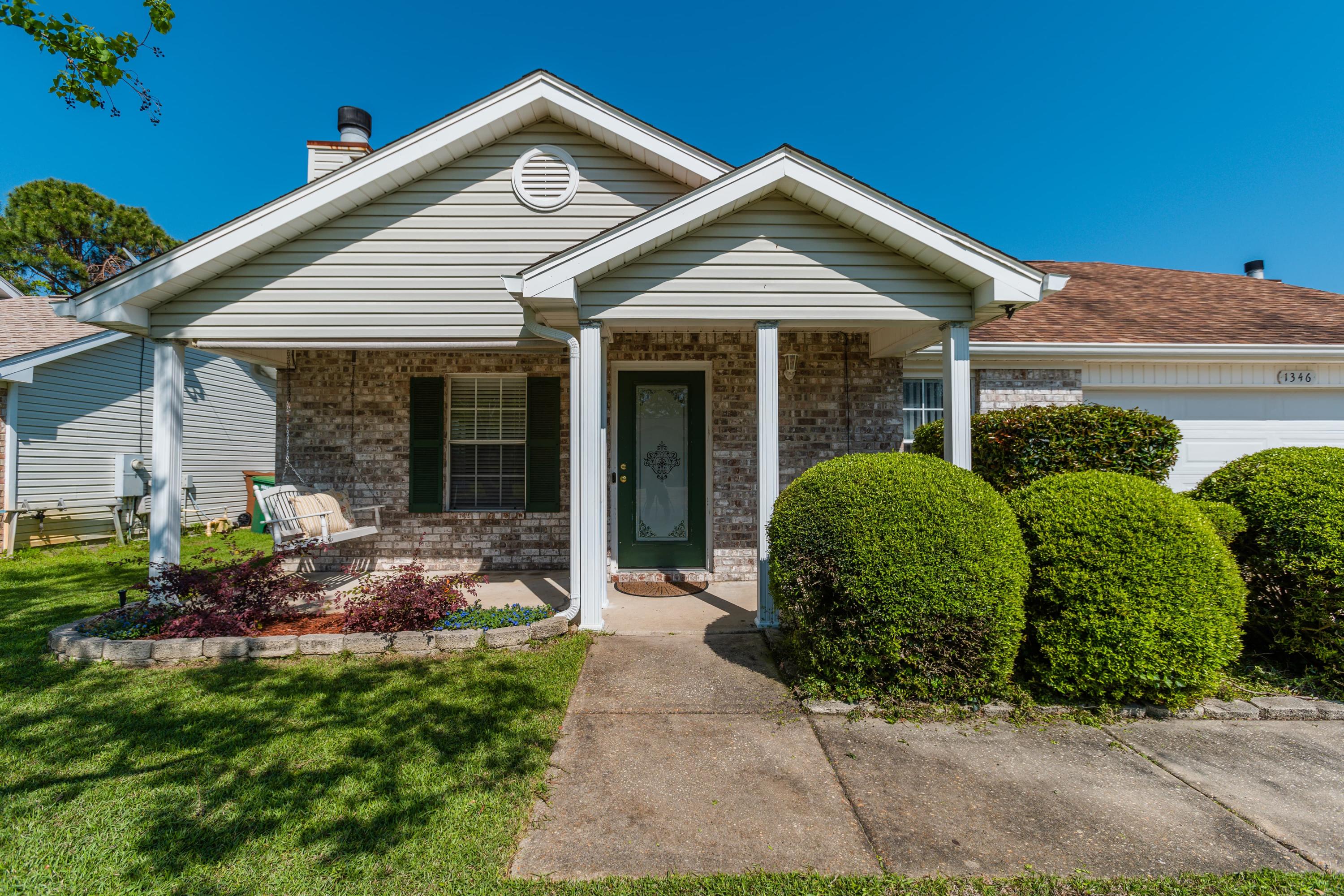 This is the total package!  Set in a charming neighborhood, walking distance to Tiger Point Park and Community Center, 5 minutes to Tiger Point Golf Club, shopping and dining or a short 20 minute drive to the world's most beautiful beaches!  The home is bright and open with vaulted ceilings and tile flooring throughout the entire house.  There is a wood burning fireplace, 2 car garage, privacy fenced backyard with workshop/shed with electricity.  The kitchen has a pantry, Bosch dishwasher and Samsung appliances, (including Washer/Dryer!), 2018 hot water heater and NEW dimensional shingle roof to be installed before closing with GAF 10 Year Workmanship Warranty & 50 Year material warranty!!