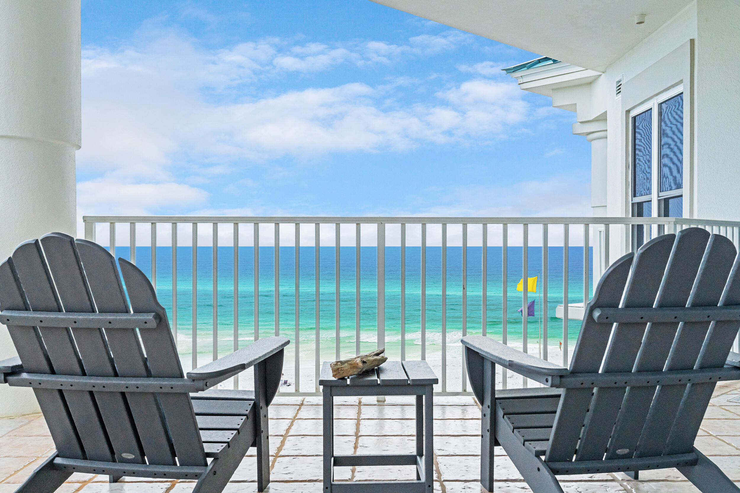 Welcome to Crabby Jack's, a beautifully remodeled top-floor corner unit at the Inn at Blue Mountain Beach  and the only Gulf-front condo currently available in the building. With sweeping east and south-facing views of the emerald coastline, this rare opportunity won't last long. Units in this low-density building rarely come to market, the last few sold in 2021, making this a truly special offering on 30A.

From the moment you step inside, you're greeted by breathtaking views and a spacious, open-concept living area that flows seamlessly to the large balcony. It's the perfect place to relax, unwind, and soak in the sights and sounds of the Gulf. Renovated in May 2021, the entire condo features all-new furniture, mattresses, and bed linens, creating a fresh, comfortable, and inviting environment for owners and guests alike.

Crabby Jack's comfortably sleeps more than most 4-bedroom units (including a charming bunkroom perfect for kiddos), making it an excellent investment with actual rental income of up to $100K since owners have managed. The primary suite is Gulf-front with balcony access and a luxurious bath that includes double vanities, a shower, and a whirlpool tub. Two guest bedrooms each have ensuite baths, one with a queen bed and one with a king, while the cozy bunkroom provides a fun and functional space for little ones to sleep and play.

Recent upgrades include impact-resistant doors and windows, offering peace of mind and durability. Guest reviews consistently praise the incredible views, thoughtful design, and comfortable accommodations, with repeat visitors calling it far superior to other units they've stayed in.

The Inn at Blue Mountain Beach offers unmatched amenities: 150 feet of private deeded beach access, a Gulf-front pool and hot tub, 50-foot atrium, fitness center, two elevators, open and covered parking, individual storage cages, and beach service. With only 48 units and a recent $1.6M renovation, this well-maintained and secure building is one of the best-kept secrets on 30A. Crabby Jack's is not just a beach condo, it's a coastal retreat you'll never want to leave.