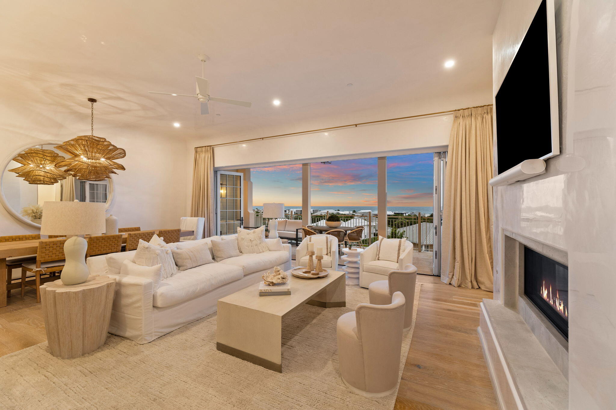 Penthouse Two at the Kaiya Club Residences captivates the senses  with sweeping, panoramic Gulf views from every angle of this exquisite residence.
Master designed by Khoury-Vogt Architects, this top floor 4 bedroom, 4.5 bath  condominium offers an open expansive living design, highlighted with custom venetian plaster throughout.  
  Bi fold doors off the grand living room open to Gulf breezes and welcome the sound of the ocean surf. The Ocean View Terrace spans to  the Master Bedroom Suite...imagine opening your eyes everyday to the Gulf views across the horizon of blue skies.The chef's dream kitchen shows off  caesarstone countertops, custom oak cabinetry, and Wolf and Sub-Zero appliances including a 36'' gas range. Coffee connoisseurs will certainly appreciate the built-in Wolf espresso machine for expertly crafted coffee drinks everyday at your fingertips. 
 A midnight kitchen bar off the living room offers the perfect opportunity for entertaining guests with a beverage center, ice machine and temperature controlled wine fridge. A bonus media room creates a well designed quiet space for movie nights or a secondary  gathering room. 
A uniquely designed fireplace serves as the centerpoint of a the great room, perfect for a cool winter's night. Whether you seek relaxation, inspiration, or a connection to nature, this residence offers the ideal retreat at Kaiya Beach Resort.
Kaiya Club Residences is a truly one-of-a-kind ownership experience on 30A. A private parking garage offers a dedicated, sheltered parking space for this penthouse unit. One of the most noteworthy highlights of this luxury condominium is the rooftop pool area, with towel service, sparkling and still water on tap, grilling area, and plenty of comfortable lounge space. This amenity is exclusively available to Kaiya Club Residences, creating low density and a serene environment overlooking the Gulf of Mexico and 30A.