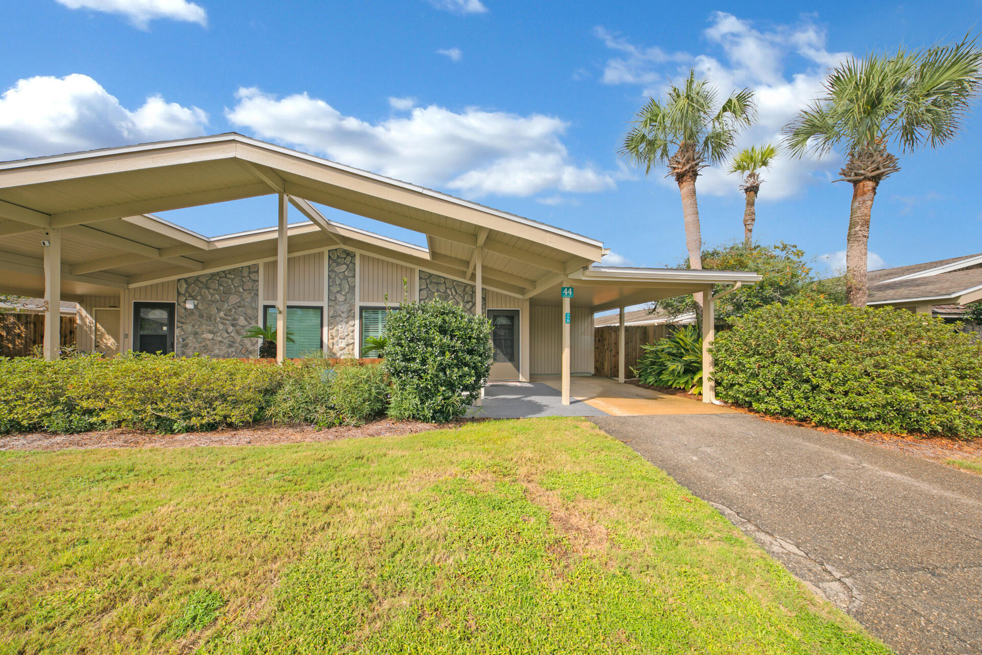 Highly sought after Tennis Village within the gated golf and tennis community of Seascape Resort.  This unit is steps away from tennis courts and the only heated pool of the 4 available in the complex. Other amenities include pickle ball courts, 7 minute walk to the Seascape Deeded beach plus the dedicated beach parking and renowned Whales Tail Restaurant/Bar.  This is a turn key unit which has a private court yard, personal carport with electric waiting for your golf cart, washer dryer, Wemo wifi dimmable LED lighting, vaulted ceilings, new impact resistant windows including a new sliding door (2020), remodeled bathroom (2019), ecobee WiFi thermostat (2020), and wonderful quiet dead end street for adults and kids.