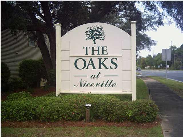Second floor condo in the popular Oaks condominiums of Niceville. Conveniently located in the heart of Niceville for commute  to Northwest Florida State College and Eglin Air Force Base. This 2 bedroom, 2 full bath unit come complete with all the appliances, (ice maker not warranted)including a full sized, stacked, washer and dryer. The community pool is located in the middle of the complex and gazebos and barbeque grills are provided as well. Master ensuite bath has tub/shower combo while hall full bath has step in shower. Basic Tv cable is included in month rent. No pets and no smoking allowed. Reminder, anyone 18 years old or over wishing to live in the property must fill out an application and be on the lease. Tenants required to carry renter's liability insurance