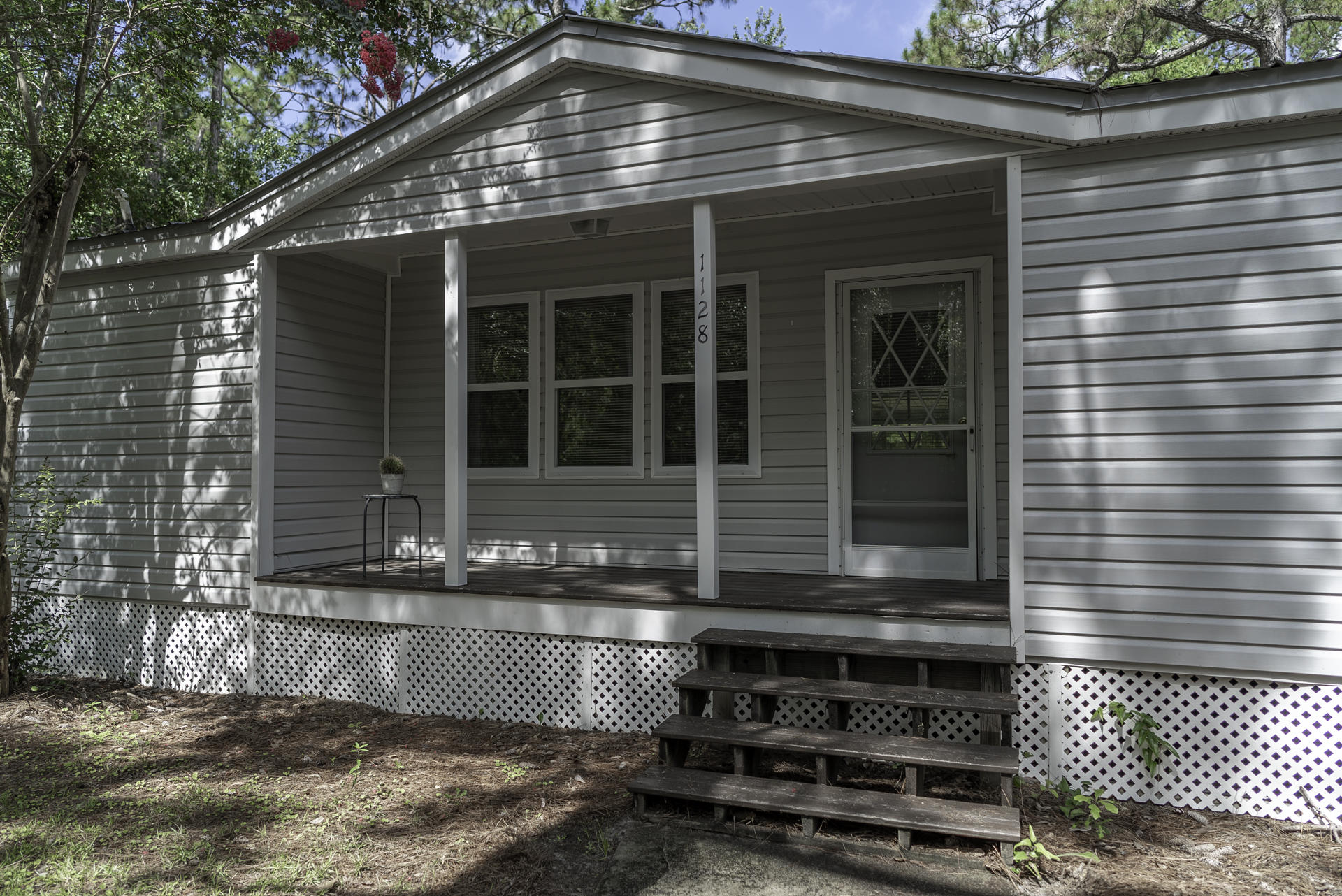 Premium Privacy in Point Washington! New carpet, flooring and paint! Located on a private drive, this charming rental is a short drive to 30A and the Bay! Enjoy summer evenings on a large screened porch overlooking a fenced in backyard and pond. Open living area with a wood burning fireplace, 3 bedrooms, 2 full baths, large kitchen, dining area, washer/dryer hookup, 2 car carport with storage and plenty of closets! Vacant and Move in ready.
$1600 security deposit and $300 non-refundable pet deposit.