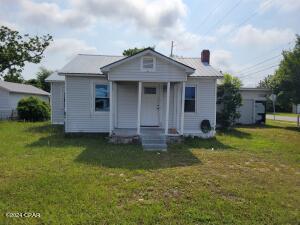 UNDER CONTRACT WITH CONTINGENCIES; SELLER ACCEPTING BACKUP OFFERS.
FLIP OPPORTUNITY - PROPERTY IS ALREADY PRICED TO FLIP - SO BUY IT, MAKE YOUR IMPROVEMENTS AND BE READY FOR SIGNIFICANT FINANCIAL GAIN!  Some drywall and paint work is already done, but needs a remodel/renovation.
The perfect, quaint Florida Cottage located right in the middle of it all! Located on a large quarter acre (+/-) lot with two large outbuildings for storage. Also, plenty of room to park a boat, and any other of your 'toys.' Conveniently located across from Parker Elem. School which would allow a growing family easy access to their school facilities. Just imagine the possibilities of owning a super-affordable home right in the most beautiful & growing area of Panama City, Florida! This 3 bedroom / 1 bathroom deal is like a dream. Solidly built, & constructed with love and care (solid wood throughout), & recently updated bathroom. You are going to be absolutely amazed at the superior location of this home. Come find out why this home is the most affordable deal in Panama City.