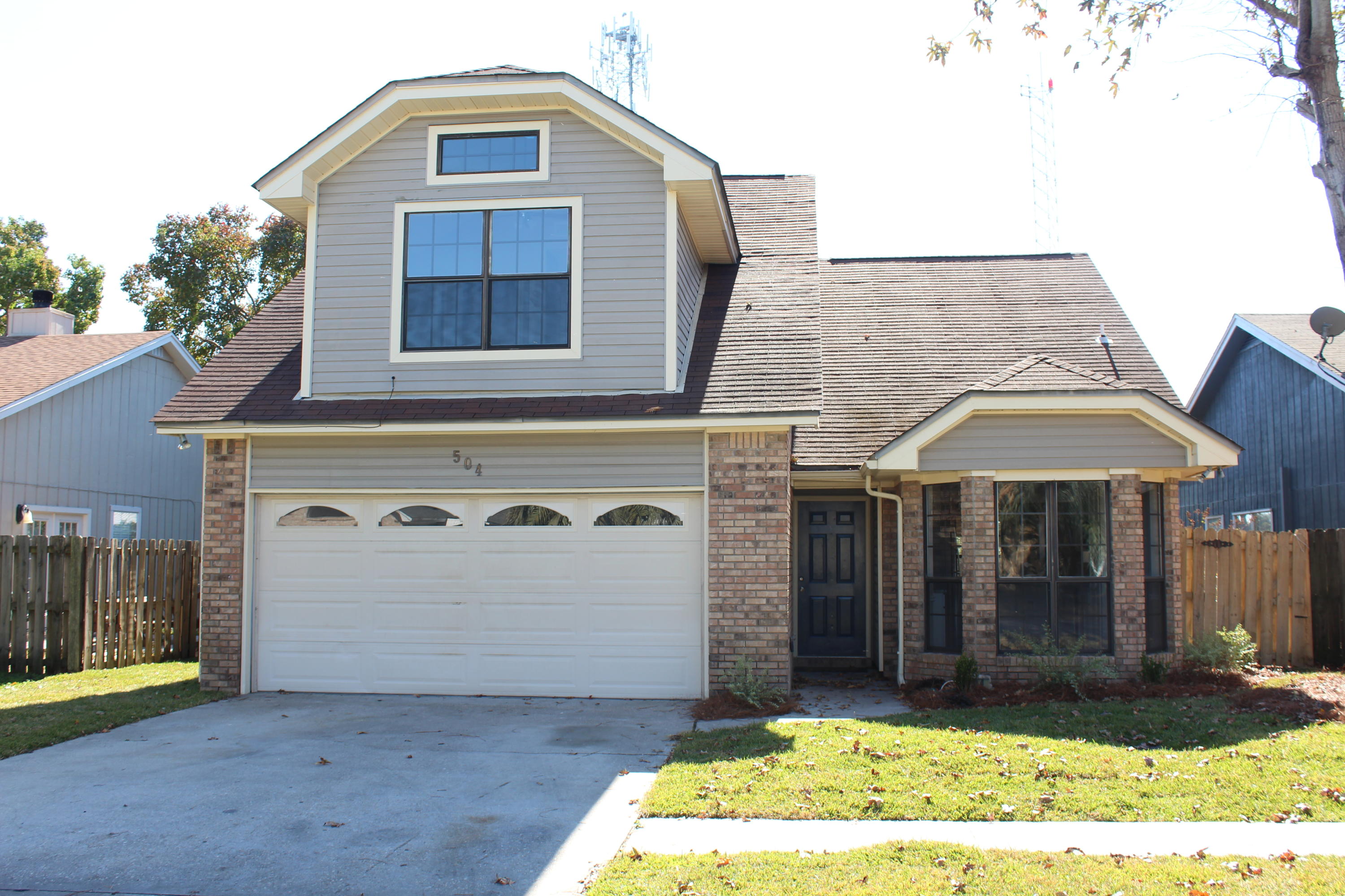 Completely remodeled and updated home with 1483 sq ft, 3 bedrooms, 2 bathrooms built in 1987! This home provides convenience to the bases, restaurants and shopping. The interior of the home features and updated kitchen with white shaker, custom cabinetry, stainless appliances, and brushed nickle hardware and faucets! The granite is 3cm and is absolutely gorgeous! There is an eat in area in the kitchen with bay windows. Windows are double pane and bronze frames! The kitchen opens up to the dining room and living room! The breakfast bar seats 2-3 comfortably! There are vaulted ceilings throughout he foyer, dining, and living room area! The living room also features a wood burning fireplace and French doors to the screened and tiled patio! This is a great space that over looks a fenced in back yard! The fence is shadow box design and has a back gate to the park! 
The master bedroom features trayed ceilings and beautiful windows overlooking the backyard! The master bathroom was completely renovated with a walk in shower - tiled with white subway tile. The bathroom also features a walk in closet, new vanities (2), new lights, granite countertops, brushed nickle hardware, and more! The stairs and one of the bedrooms features new carpet. The upstairs bathroom was also renovated to feature a new vanity, mirror, light, toilet, and tiled flooring. The entire home was professional painted. The floors were tiled with drift wood like tile! It is gorgeous! One of the upstairs bedrooms also features vaulted ceilings! All the lights throughout the home were updated! All bedrooms and the living room have ceiling fans! New chandeliers were added to the dining room and foyer. The home also has some recessed lighting! The exterior of the home is brick and vinyl! The yard was has brand new sod, gorgeous pine straw, and new landscaping! All trees were trimmed and a new front side walk was added! This home features a two car garage! The home also features a skylight and gutters!