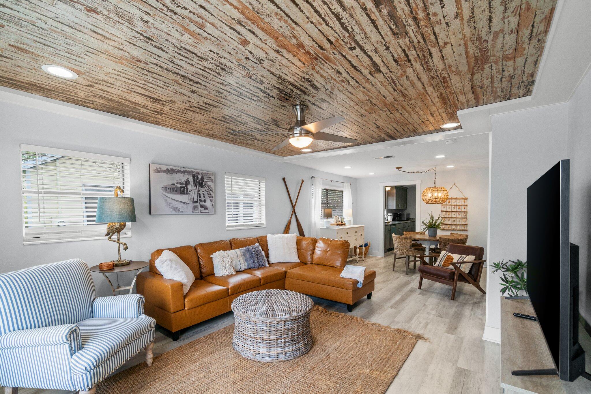 HERE IT IS!  You've found your adorable beach home in the quaint town of Port St Joe, and it's ready for you RIGHT NOW!

Coral Reef has been COMPLETELY REDONE inside and features the following: --Fully furnished and ready to rent or enjoy
--Fabulous screened-in front and back porches with ceiling fans
--Open living/dining space
--Beautiful wood detail on ceilings
--Spacious kitchen with large sink, pantry, and plenty of cabinets
--Owner's closet for secure storage
--Beachy colors and decor details
--Adorable penny tile in bathrooms
--LVP flooring in bedrooms, living spaces
--Tankless water heater
--Separate laundry room
--Large backyard with firepit and grill
--Room for a pool!
--Outdoor shower
--Fully fenced for privacy
--36' x 48' pole barn behind backyard (Store your RV or make it an extended entertainment space!)
--Metal roof
--Quiet street
--Carport/covered parking for one vehicle
--Additional driveway spot
--Sidewalk in front; walk to downtown!
--Effective year built:  2003

PLEASE NOTE:  The RV and golf cart do not convey.  Selected decor items are excluded. 
See list, attached.