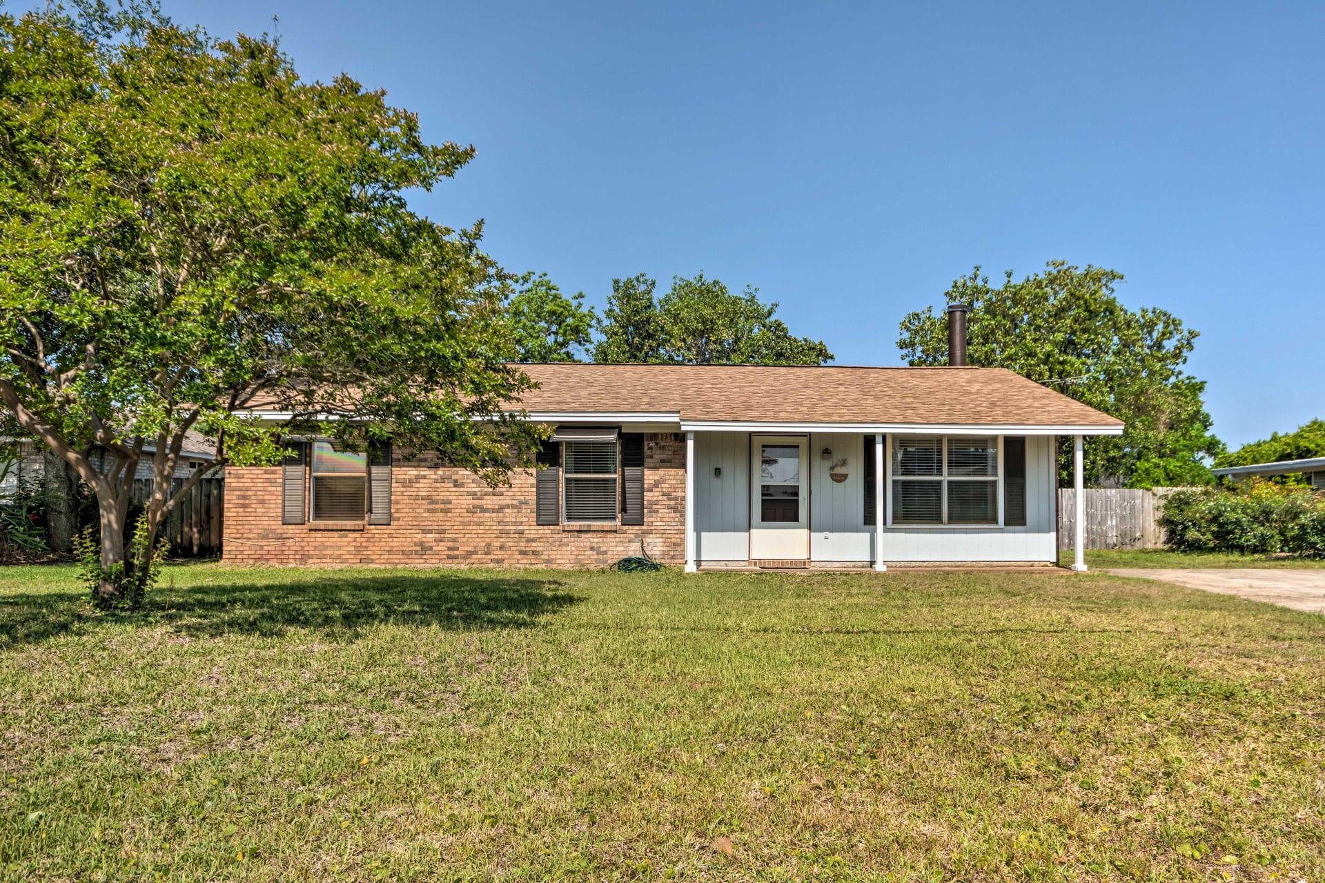 This unique fully furnished 3 bed 2.5 bath cozy brick home is located in Gulf Breeze in Santa Rosa Shores subdivision. Conveniently located to excellent schools, Pensacola Beach, Tiger Point golf course, and walking distance to the sound for fishing and swimming. The community offers, a park,  tennis courts, basketball court, playground equipment. As you enter the family room, you have tile floors and a beautiful stone fireplace located between the living room and Dining room. The kitchen boasts stainless appliances, butcher block counter tops and a breakfast nook. Master bath shares a door with hall bath. Florida room is spacious, eat in bar, tile floors and a separate shower. Fire pit is in the fenced in back yard for those cool nights with the family, No Pets and No Smoking on property.