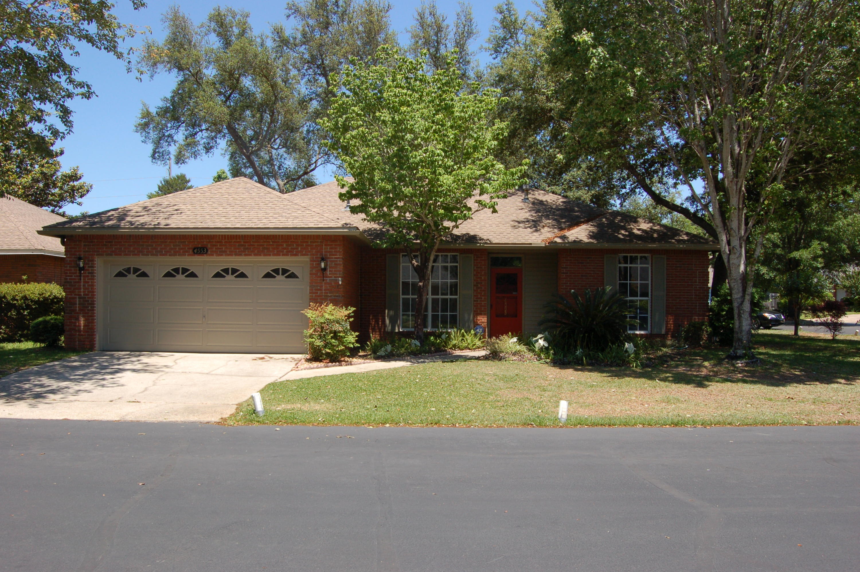 Brick charmer home on a corner lot in cul-de-sac, just a stone's throw from Bluewater Elementary School. Completely renovated, no more popcorn ceiling! Midnight blue kitchen cabinets with white underneath are perfect for distressing. New flooring, paint, kitchen, bathrooms and fixtures. Kitchen has new Silestone quartz countertops and new appliances along with Island that is movable but not on wheels. Extra room with French doors can be office or formal dining room. Roof is under 10 years old w/30 year warranty. New HVAC, and ducts. Screens and glass windows are a great feature for this enclose tiled Florida room included in sq.ft. Large fenced back yard and large side yard big enough for a pool.
This home is very user friendly, with large kitchen and family rooms. Split floor plan master on one side, "Jack and Jill" bedrooms on the other, full bath on each side w/ new tile floor, tub, & Stone work in guest bath.  Master has walk in closet and large tile walk in shower.  Neighborhood is friendly with good mix of elders and families with kids.  This is a must see to appreciate all the renovation done to make this a turn key ready home.