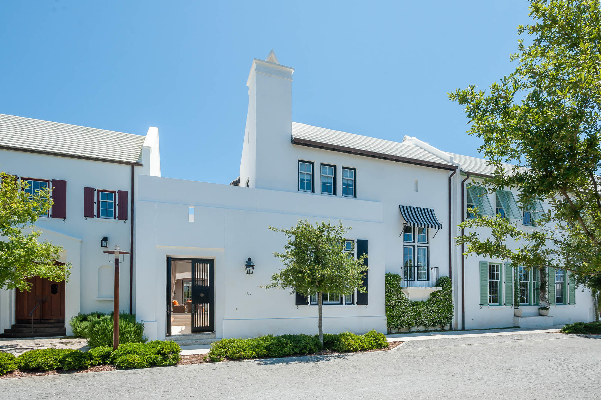 Primely located in the heart of Alys Beach, this 2,561 sf courtyard home was custom designed by renowned architect, Eric Watson. Two separate courtyards, each with private loggias, offer quintessential Alys Beach living. A private master bedroom is complemented with two first floor guest suites. The dining room looks out to each courtyard and is defined by a vaulted timber beam ceiling. A large living room provides a sense of comfort and ease with an inviting fireplace and 13 foot ceilings. Natural coral stone countertops, venetian plaster, and slate flooring are just some of the luxury finishes found throughout this home. This property is being offered with professionally installed furnishings.