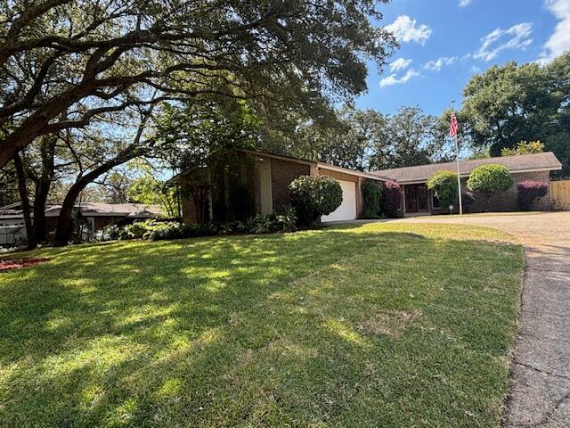 Available March 6th!!

Pets considered with owner approval

Welcome to this wonderful 4-bedroom home nestled in the established Lake Lorraine subdivision. Surrounded by beautiful, mature oak trees, the property offers a perfect shaded retreat for those warm Florida days. Ideally located just a short distance from the beach and within easy reach of the shops and stores in Destin and Fort Walton Beach, this home provides the best of both relaxation and convenience. Equipped with a functional security system for added peace of mind.

Step through the leaded glass front doors into a spacious, inviting living area—ideal for hosting family and friends. For outdoor entertaining, walk through the double glass doors to enjoy the pergola-covered patio in the peaceful backyard. Storage is abundant, with a hall closet and two pantries to meet all your storage needs.

The open kitchen is sure to impress, offering ample space for cooking and gathering. Whether you're relaxing inside or taking in the scenic outdoor spaces, this home offers an exceptional blend of convenience and serenity.

**All pets are registered via pet screening, and all assistance animals are verified through the same screening process.**

**Carpet cleaning & Admin Fee charged (if applicable)**

Tenant to verify all data. Please contact Sound Choice Real Estate to schedule a showing- 850-389-8533.

***Approval is based on several factors as follows***
- Rental History and Verification
- Employment History and Verification
- Credit History
- Criminal Background & Terrorist Database Check
- Pet Verification