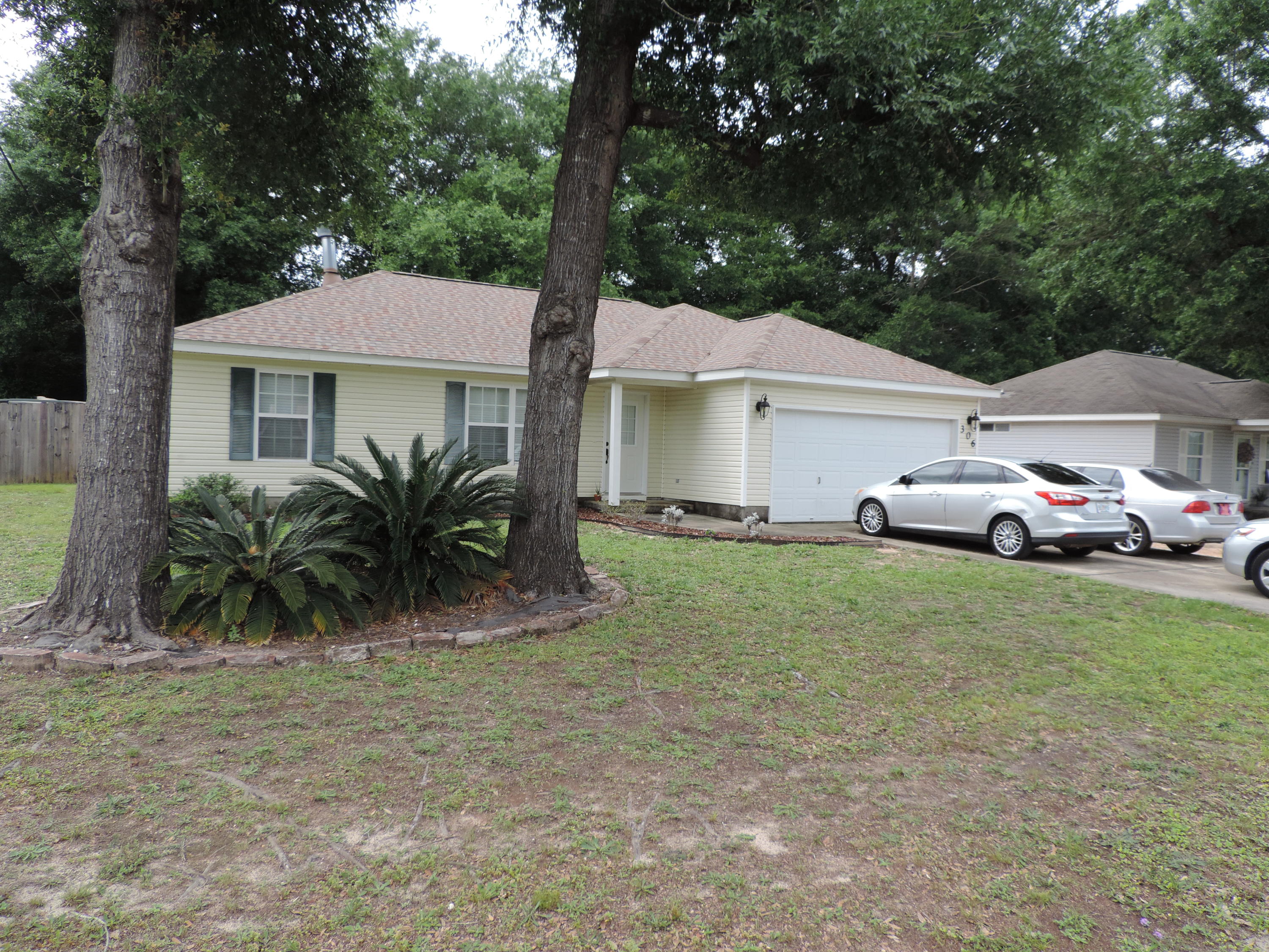 This home is located in the Winding Creek Estates neighborhood and has been well maintained. It features a split floor plan with 3 bedrooms, 2 bathrooms and a 2 car garage. Upon entering this lovely home your eyes are drawn to the fireplace that is perfect for those occasional chilly evenings and the cathedral ceiling to give a light and airy feel to the Great Room. To the side there are two bedrooms and a hall bath. On the other side a large private Master bedroom and bathroom allow privacy for the occupants. The The roof was installed in 2019 along with a French door that leads to the patio in back. Off the patio there is a covered storage shed that is perfect yard tools and patio furniture. Come take a look it wont last long!!