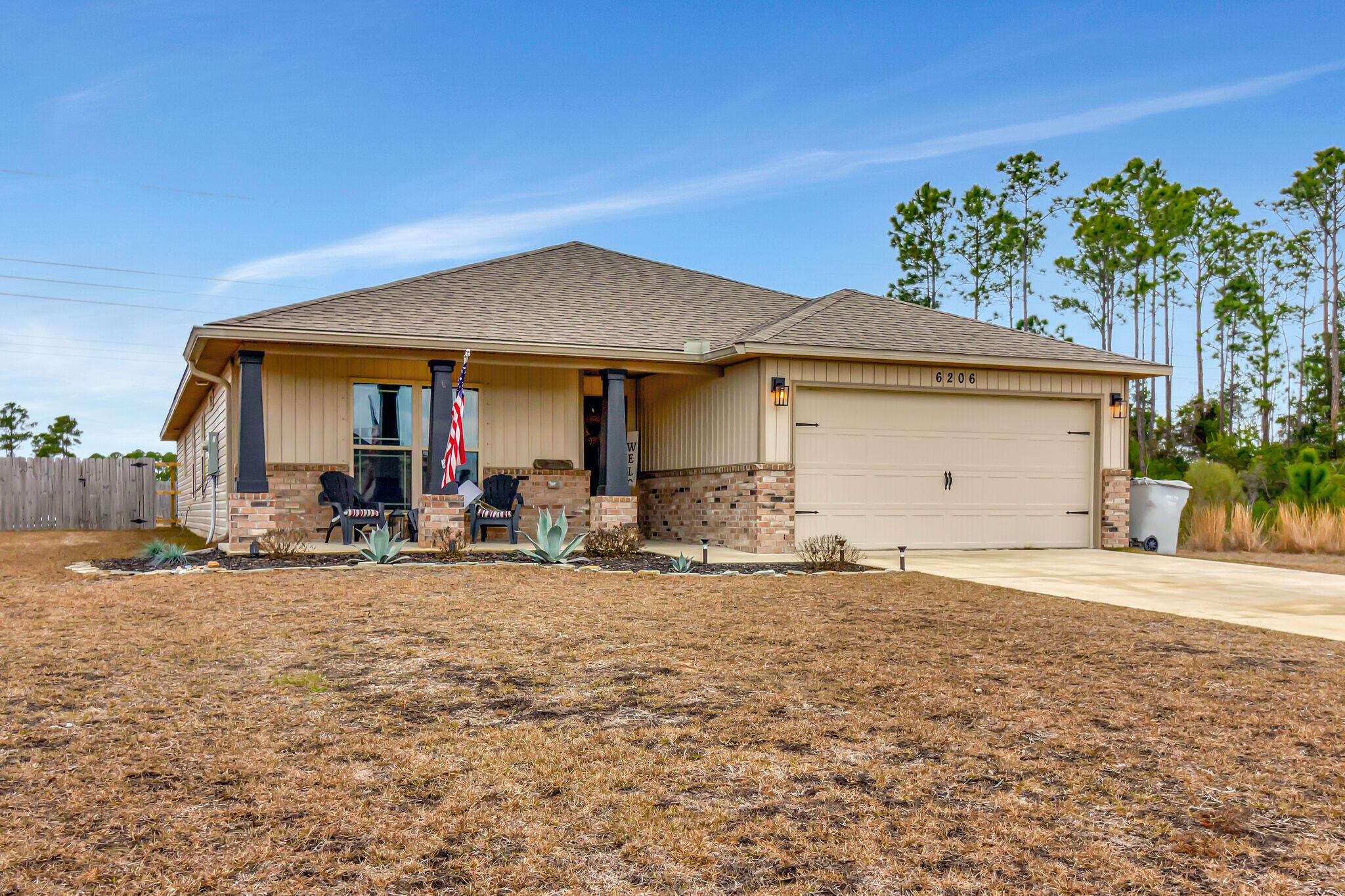 Welcome to this beautiful 4-bedroom, 2-bathroom home located in the desirable Gulf Breeze, FL. This spacious house offers a comfortable and inviting atmosphere for anyone looking to settle down in a peaceful neighborhood. The kitchen features a convenient island, perfect for preparing meals and entertaining guests. With a large lot, you'll have plenty of space to enjoy outdoor activities or create your dream garden. The fenced yard provides privacy and security, allowing you to relax and unwind in your own oasis. Additionally, there is a separate fenced dog run, ensuring that your furry friends have their own designated area to play and explore. Whether you're hosting a barbecue or simply enjoying a quiet evening, the covered patio is an ideal spot to enjoy the fresh air and beautiful  surroundings. This house is perfect for those seeking a comfortable and spacious home in a prime location. Don't miss out on the opportunity to make this home and experience the best of Gulf Breeze living. Contact us today to schedule a tour and see all that this wonderful home has to offer. 850-729-0399 or apply at rentwithbsr.com