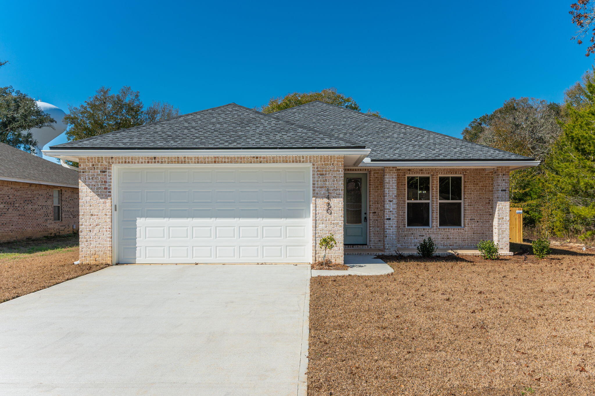 ***BRAND NEW home for rent*** Be the first to live in this gorgeous new construction 4 bedroom all-brick home designed with comfort and style in mind. The open concept floor plan showcases a modern kitchen with granite countertops, stainless steel appliances and a spacious pantry - perfect for entertaining and everyday living. Laminate wood flooring flows throughout the home, complemented by elegant crown molding in the main living areas. With a private fenced in backyard and a 2-car garage, this home offers both functionality and charm. Located just minutes away from Schools, Shopping, Military Bases, and the beach is just across the bridge!! Don't miss your opportunity to make this beautiful home yours! Contact us today for a showing!
