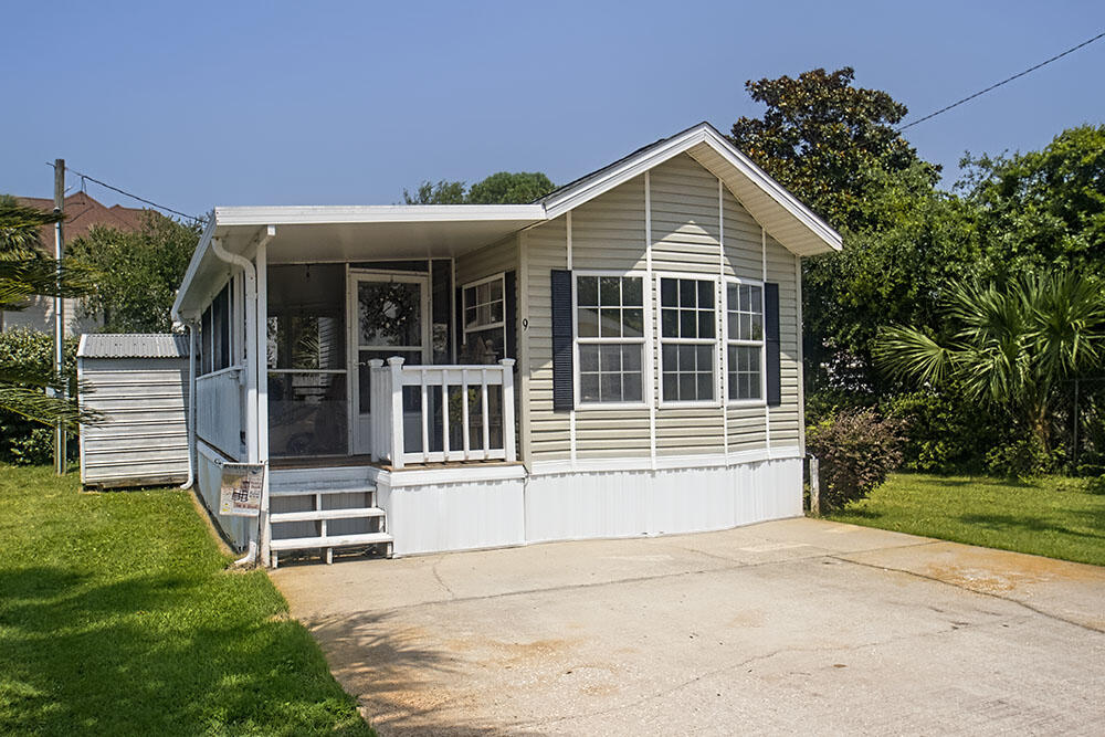 Owner Financing Available!  Nestled in one of Miramar Beach's most desirable gated communities, this beautifully remodeled 1BR/1BA home in Fox Run Park is just two short blocks from the sugar-white sands and emerald waters of the Gulf. Featuring brand-new flooring, fresh paint, granite countertops, and a host of other upgrades, this coastal retreat is move-in ready. After a day at the beach, unwind on the inviting screened-in porch and soak in the relaxing Florida breeze.