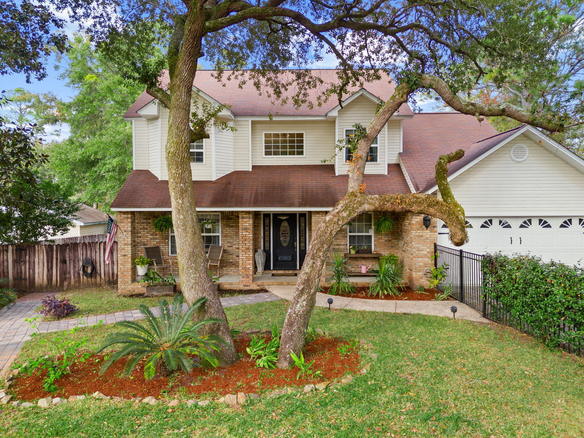 WATERFRONT Home! CONVENIENTLY located just minutes from the beaches of 30A and a short boat ride down the canal to Mallet Bayou and Choctawhatchee Bay. On a private no-through street. Southern style home with a front courtyard, mature live oak trees and relaxing Koi pond. Back yard features an expansive deck off the house and a dock on the canal with a boat lift, ready for your boating adventures. Walking through the front door you get that grand entrance feeling in the foyer and notice the beautiful custom lighting. LVP flooring throughout whole home. Kitchen is open concept with sitting area and breakfast nook attached, along with a wood burning fireplace in the sitting area. Formal living space and dining room are adjacent for great entertainment options. A half bath is also conveniently located downstairs for easy guest access. 

Making your way upstairs you find three spacious bedrooms, two of which share a hall bath. The master bedroom has a walk-in closet and large bathroom featuring a jetted garden tub. Have that morning cup of coffee overlooking the water, right out of bed, on your own upstairs deck connected to the master bedroom by a set of French doors. 

Other notable features of this home is a fully fenced in back yard and front yard for the pets and privacy, while enjoying your above ground pool. A shed located in the back yard gives ample storage for tools and yard equipment. A unique bonus is an outdoor brick oven situated right by the pool on the back deck, perfect for cooking outdoors when the weather is nice. There is ample parking space in the driveway and a bonus parking area on the side of house, behind the fence, for an RV or boat. The two car garage can function as a parking space, or use it as a fun "man cave" area for games and gathering!

This is that waterfront retreat, away from it all, but close enough to get to it all, that you have been waiting for. CALL TODAY!