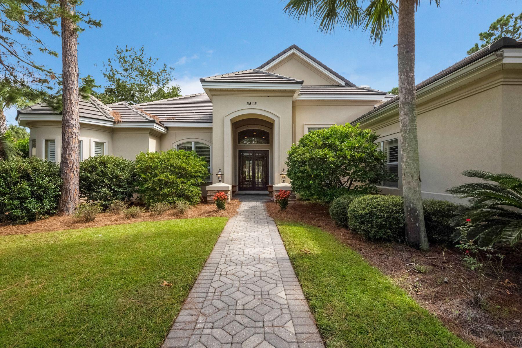 This lakefront estate in the prestigious gated neighborhood of Burnt Pine offers open architecture with astonishing indoor and outdoor living space, ideal for entertaining. French doors invite you into the expansive 30' saltwater pool with 6 person hot tub, the perfect spot for rest and relaxation. This premium location provides surprising privacy and picturesque views of the renowned Burnt Pine golf course and a tranquil lake. Imagine hosting a family barbecue from the outdoor kitchen with Thermador Grill, Pecky Cypress ceilings and direct access to the full pool bath. Relax and read a book in the plush seating area of your master suite with private access to the pool. The master bath with dual vanities, soaker tub and separate shower with 6 spray nozzles will pamper you with its spa-like atmosphere. Prepare a gourmet meal in your epicurean kitchen offering stainless appliances, granite countertops and an oversized walk-in pantry. Additional touches include an executive office with maple floors, full luxurious pool bath and gated wine cave with wet bar. Parking is plentiful with a circular driveway, flanked with lush foliage, and motor court entrance to your private three car garage.Enjoy the resort lifestyle of Sandestin with boating at Baytowne Marina, shopping at Grand Boulevard and the sugar white sands of the Emerald Coast Beaches just a golf cart ride away.